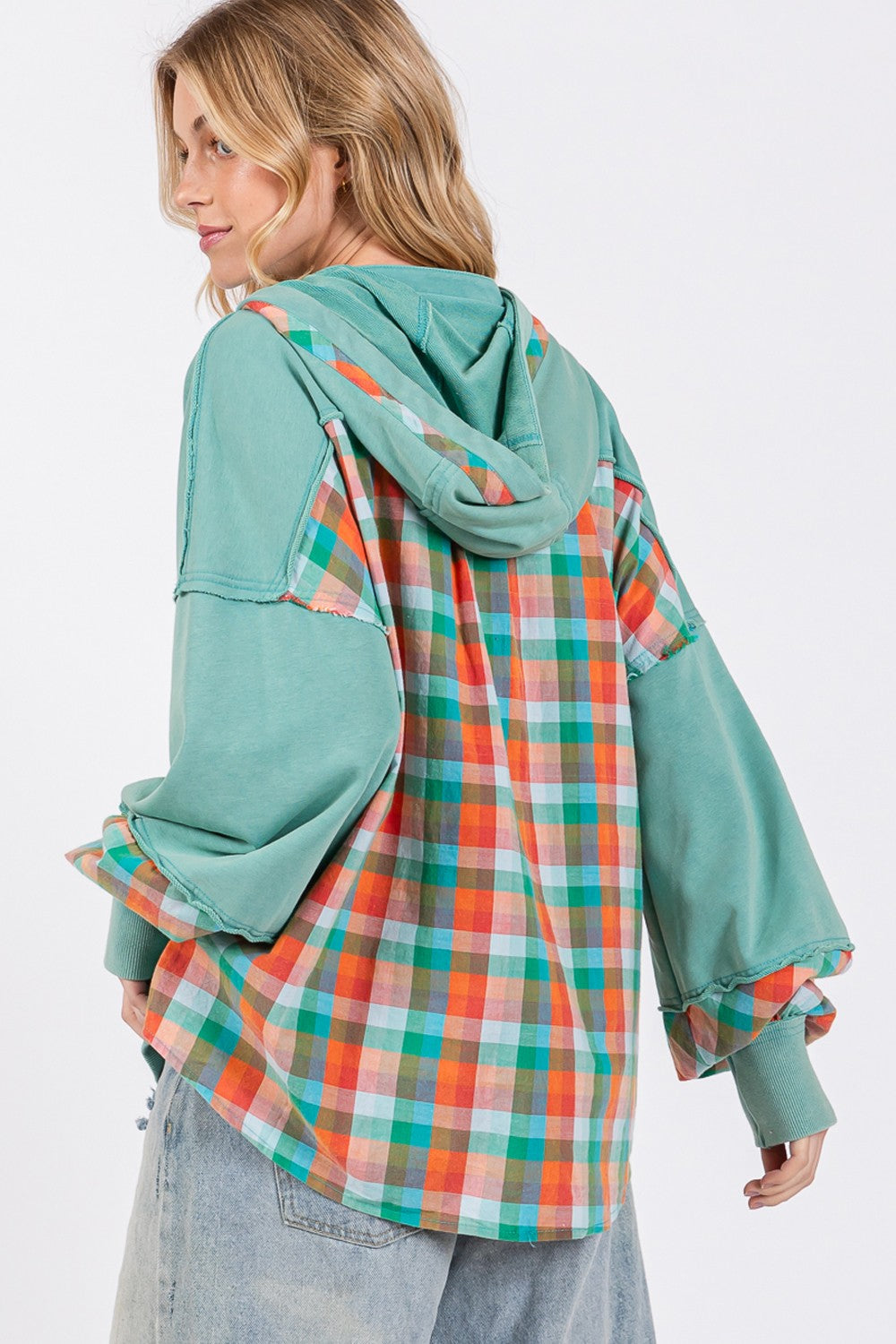 Full size plaid print washed hoodie with exposed seams, drawstring, and half buttons.