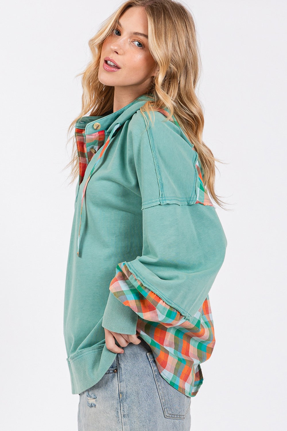 Full size plaid print washed hoodie with exposed seams, drawstring, and half buttons.