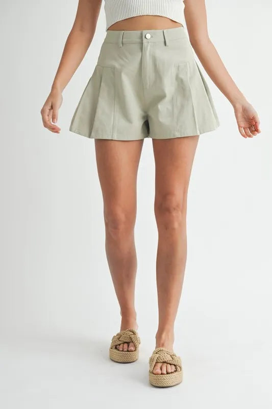 Asymmetrical denim skort with pockets.