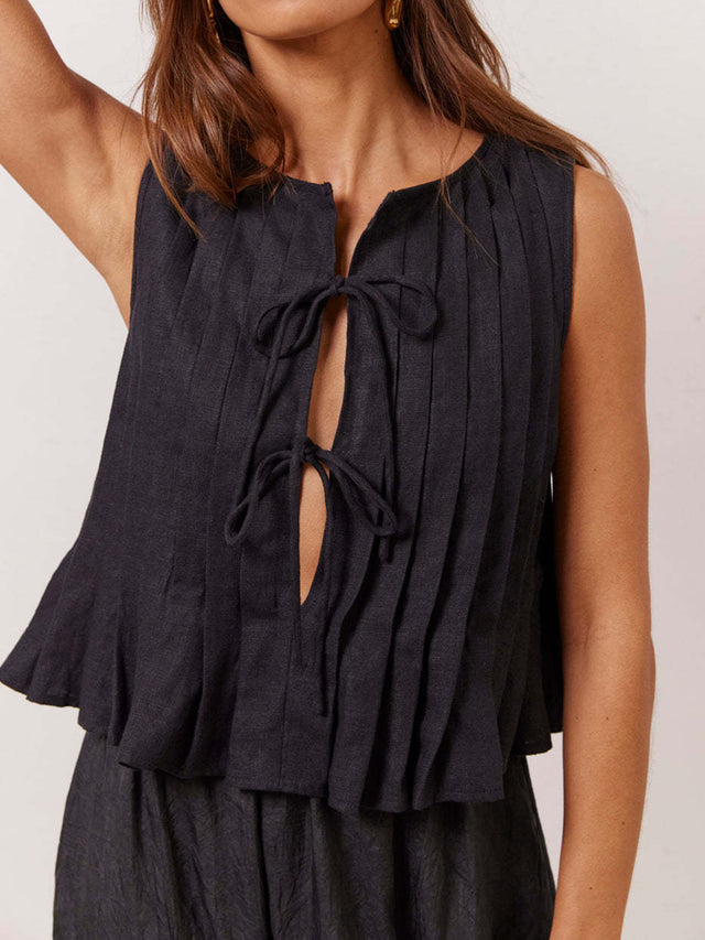 Pleated tied round neck vest.