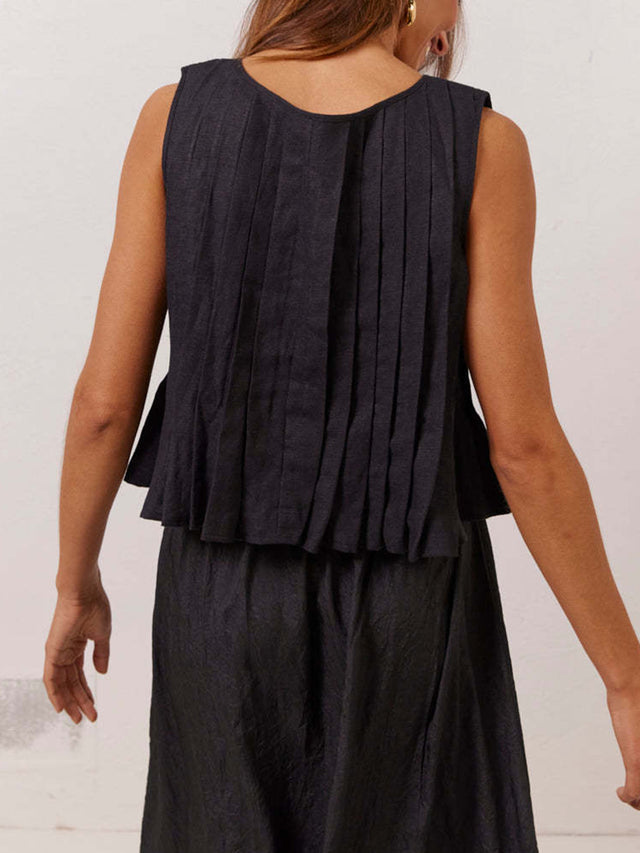Pleated tied round neck vest.