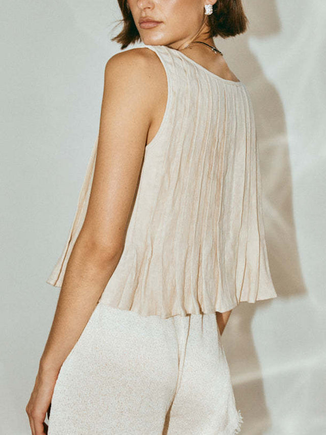 Pleated tied round neck vest.