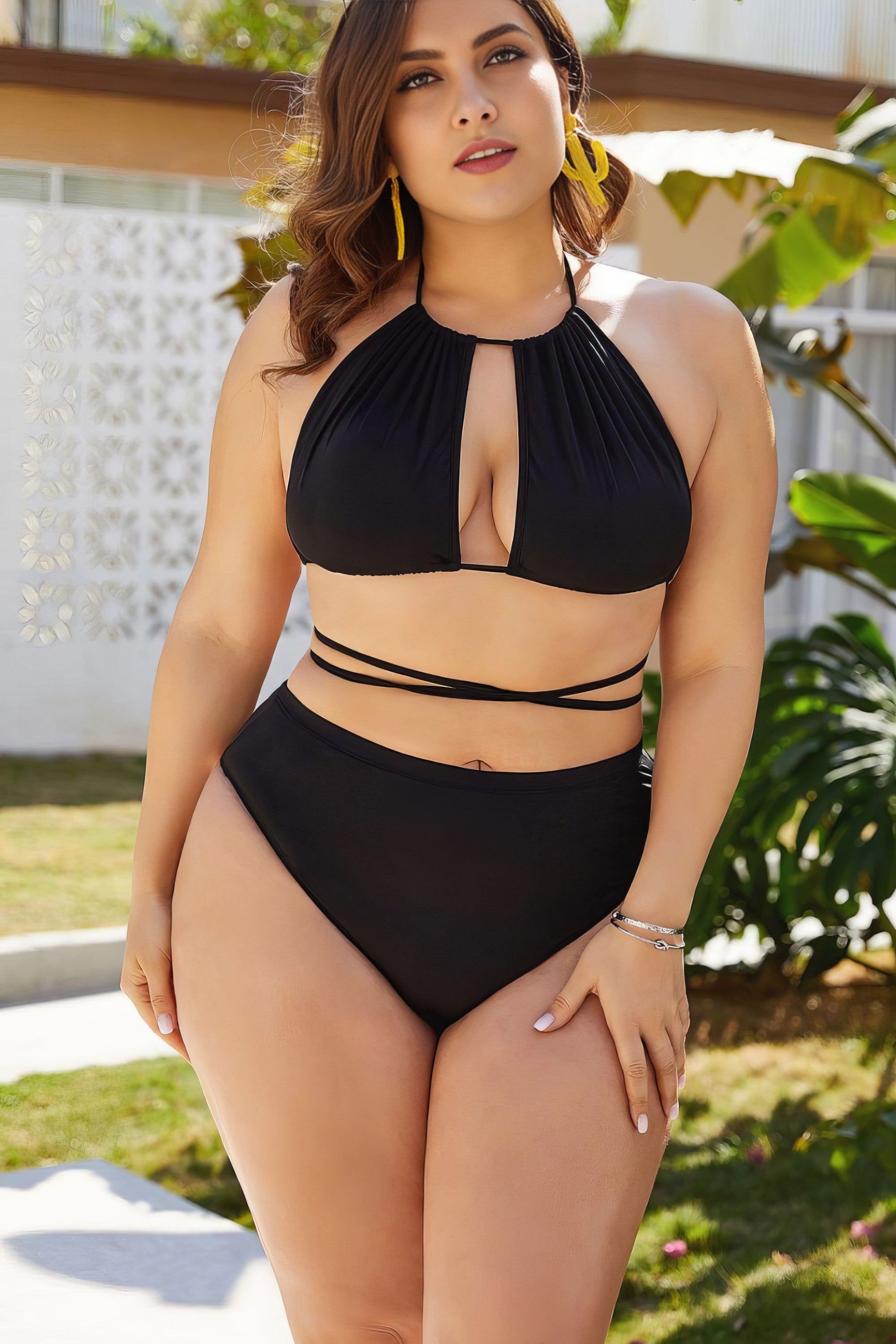 Plus size solid cutout tied backless halter neck bikini set.
