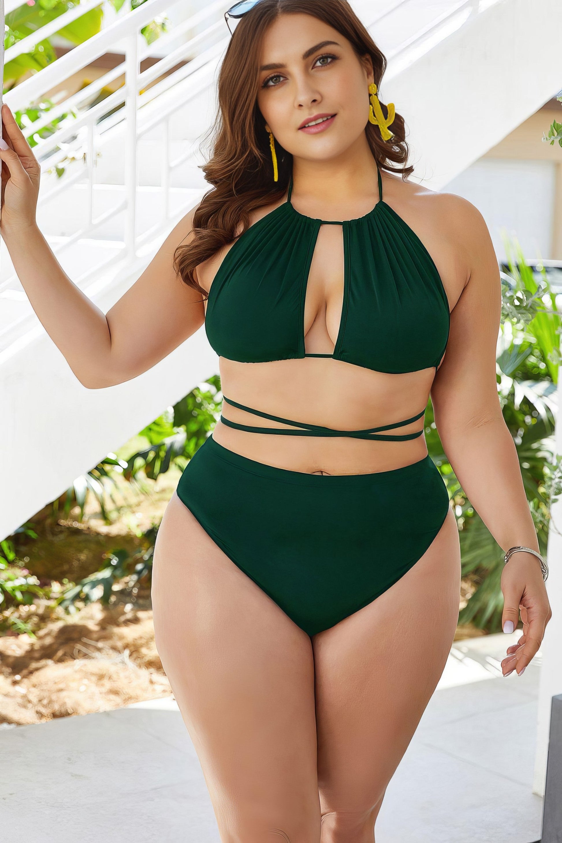 Plus size solid cutout tied backless halter neck bikini set.