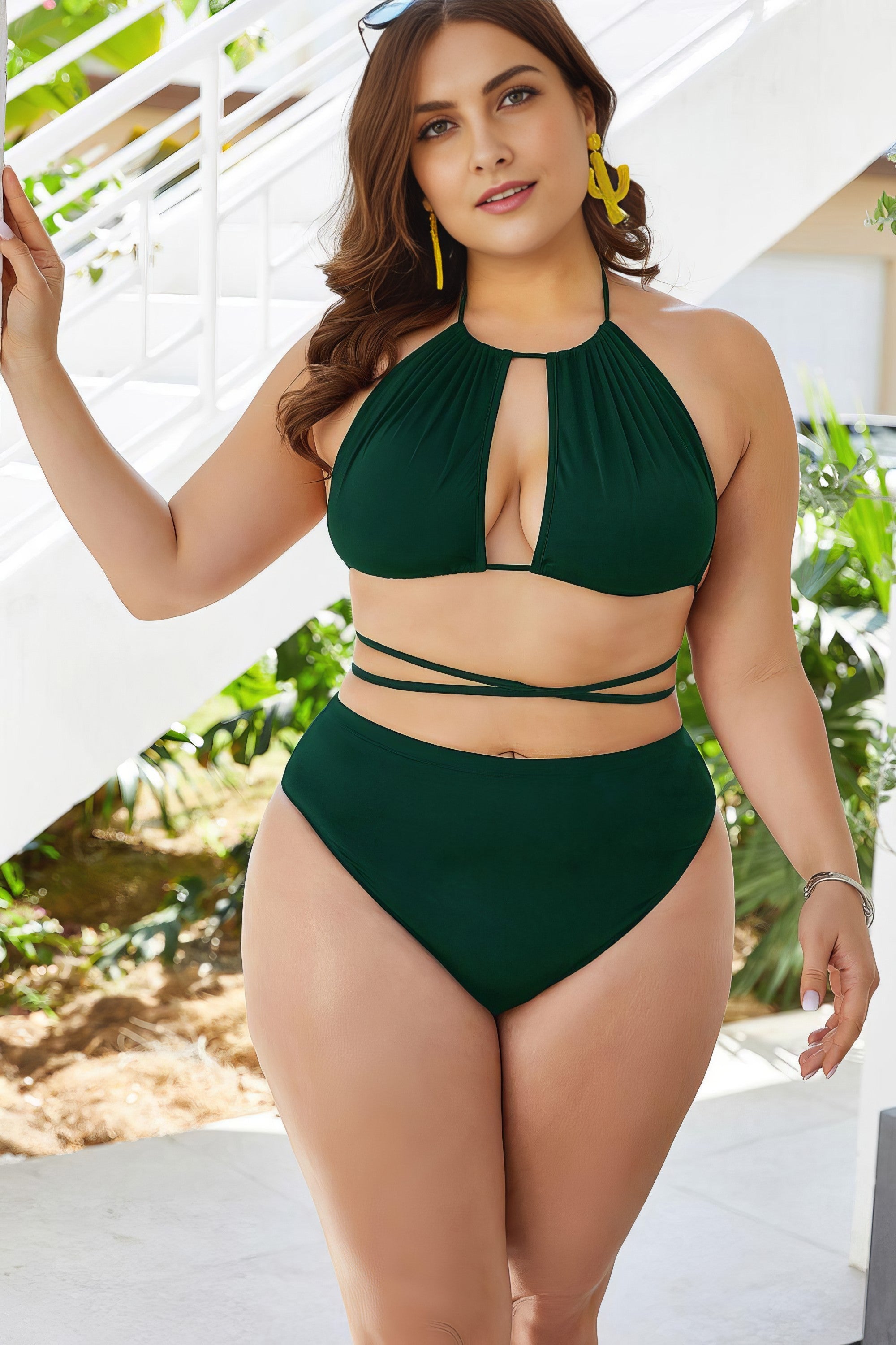 Plus size solid cutout tied backless halter neck bikini set.