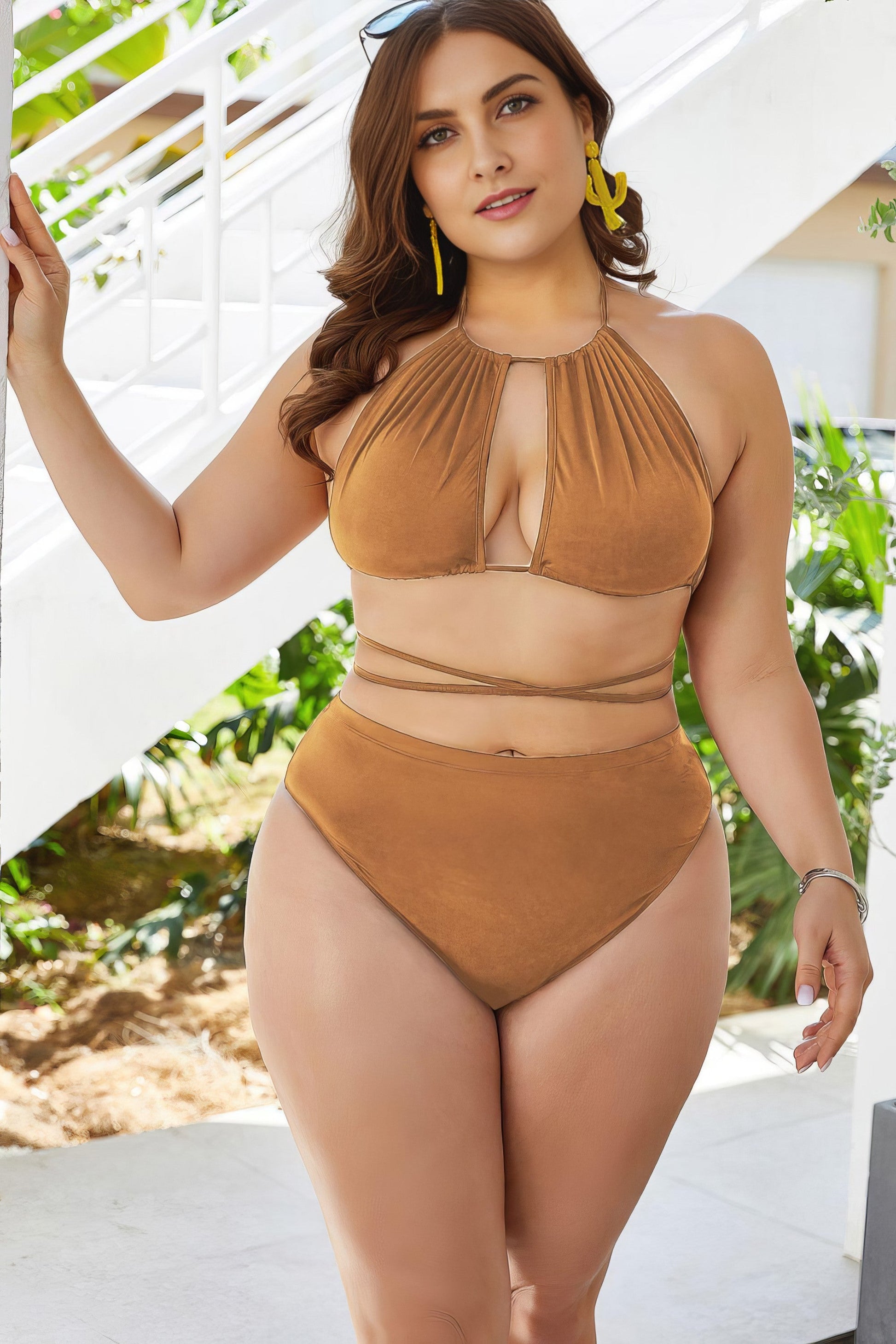 Plus size solid cutout tied backless halter neck bikini set.