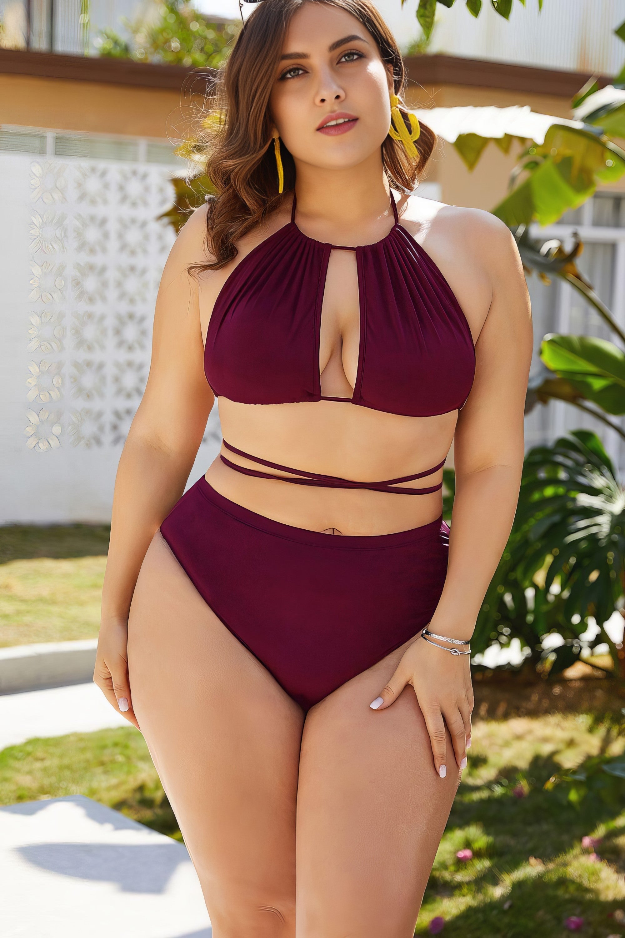 Plus size solid cutout tied backless halter neck bikini set.