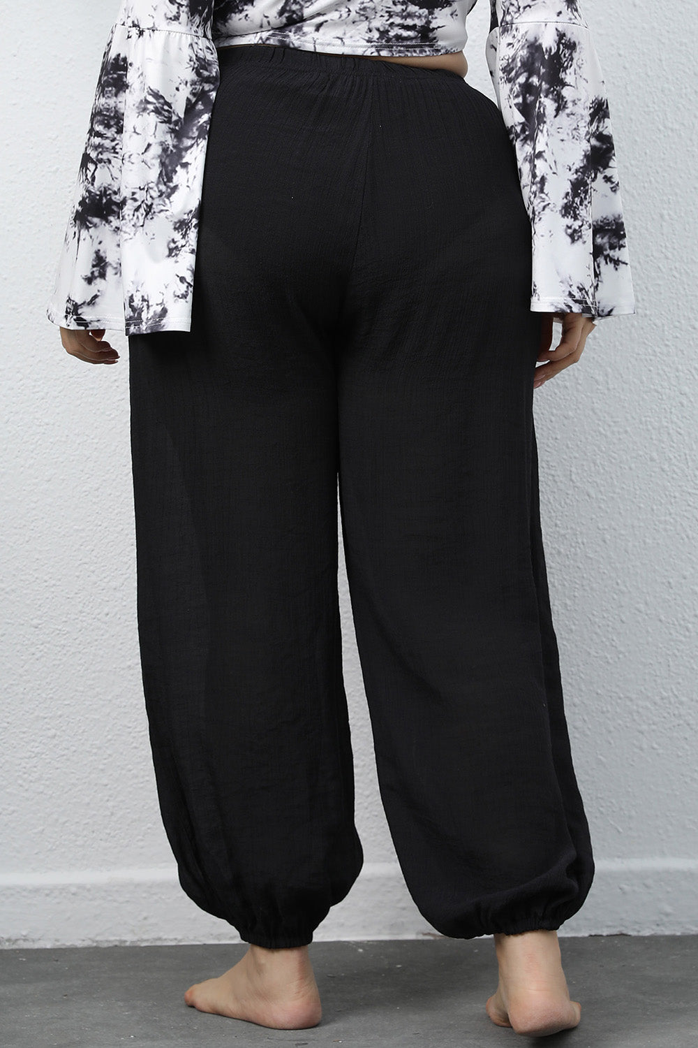 Plus size drawstring jogger pants with tie, opaque.