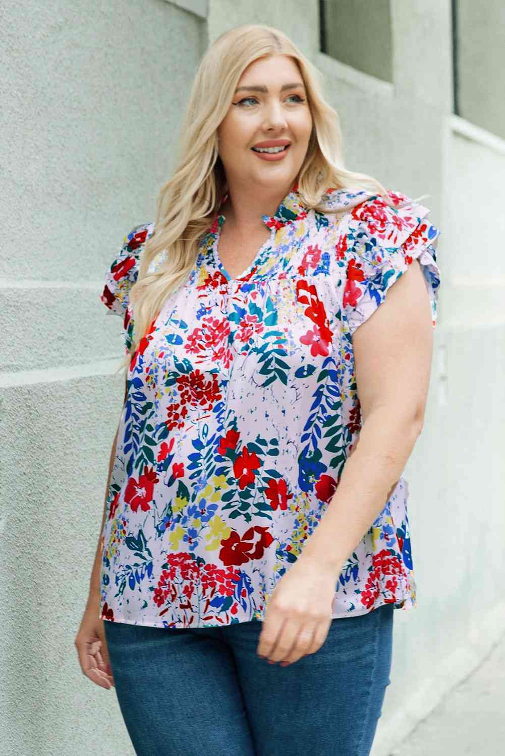 Plus Size Floral Smocked Flutter Sleeve Blouse.