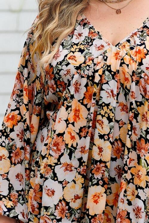 Plus Size Floral V-Neck Balloon Sleeve Blouse.