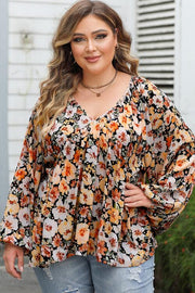 Plus Size Floral V-Neck Balloon Sleeve Blouse.