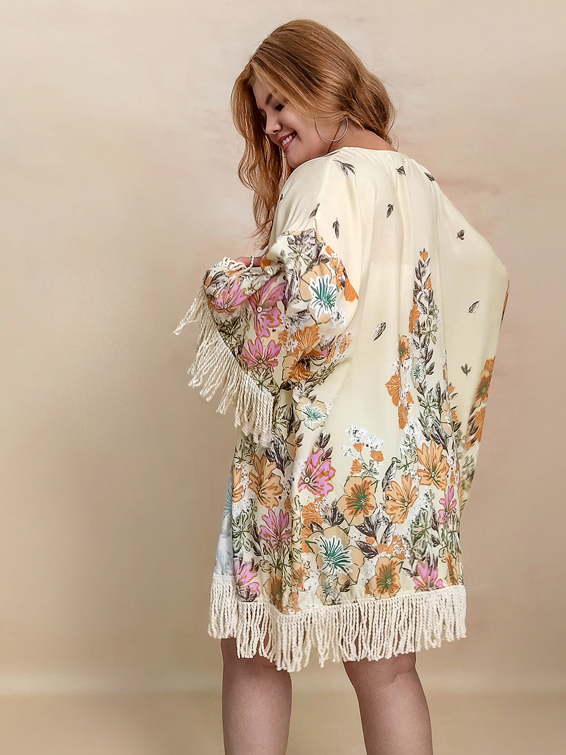 Plus size fringe printed open front cardigan.