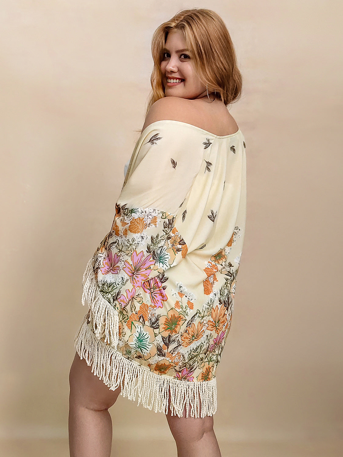 Plus size fringe printed open front cardigan.