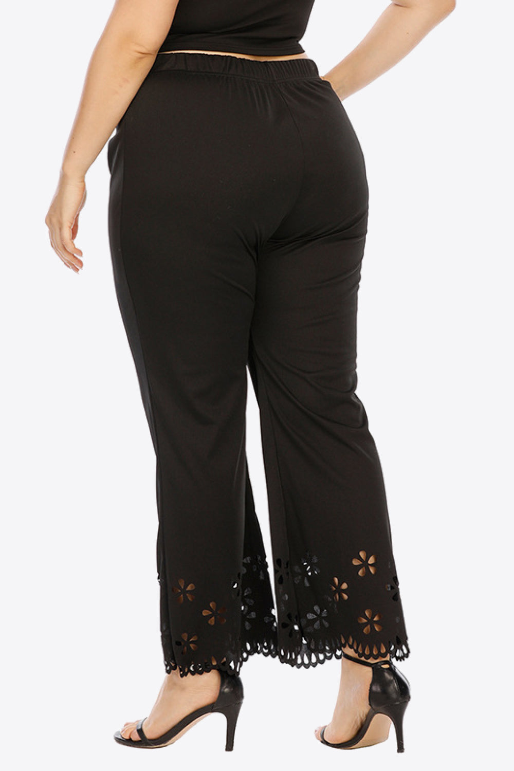 Plus size openwork elastic waist pants, slightly stretchy.