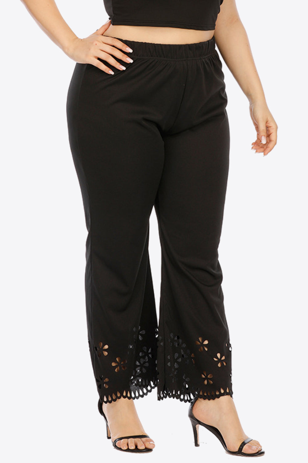Plus size openwork elastic waist pants, slightly stretchy.