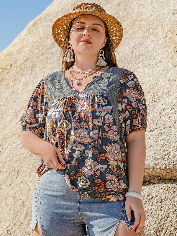 Plus Size Printed Notched Half Sleeve Blouse.