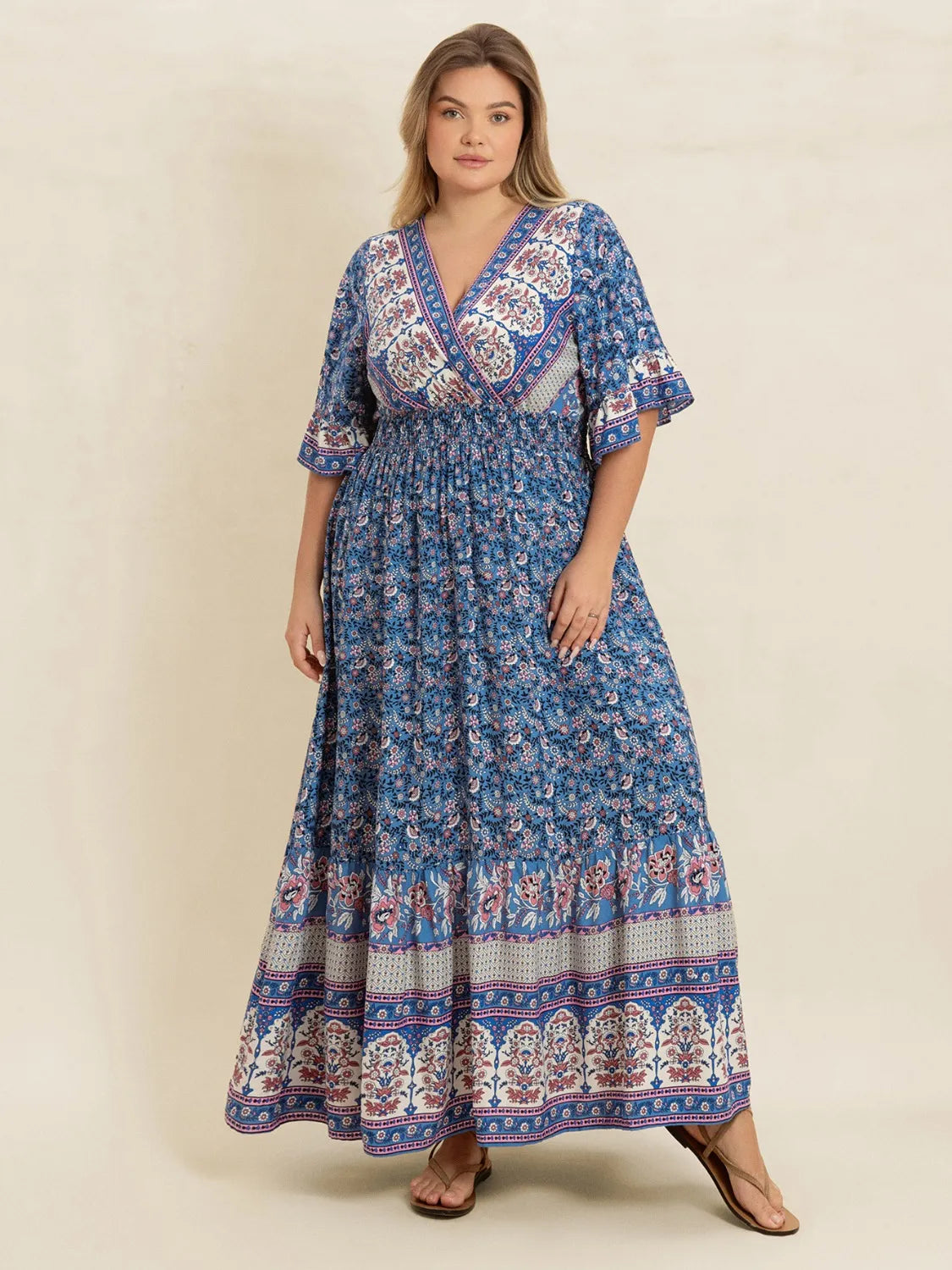 Plus Size Printed Surplice Half Sleeve Dress.