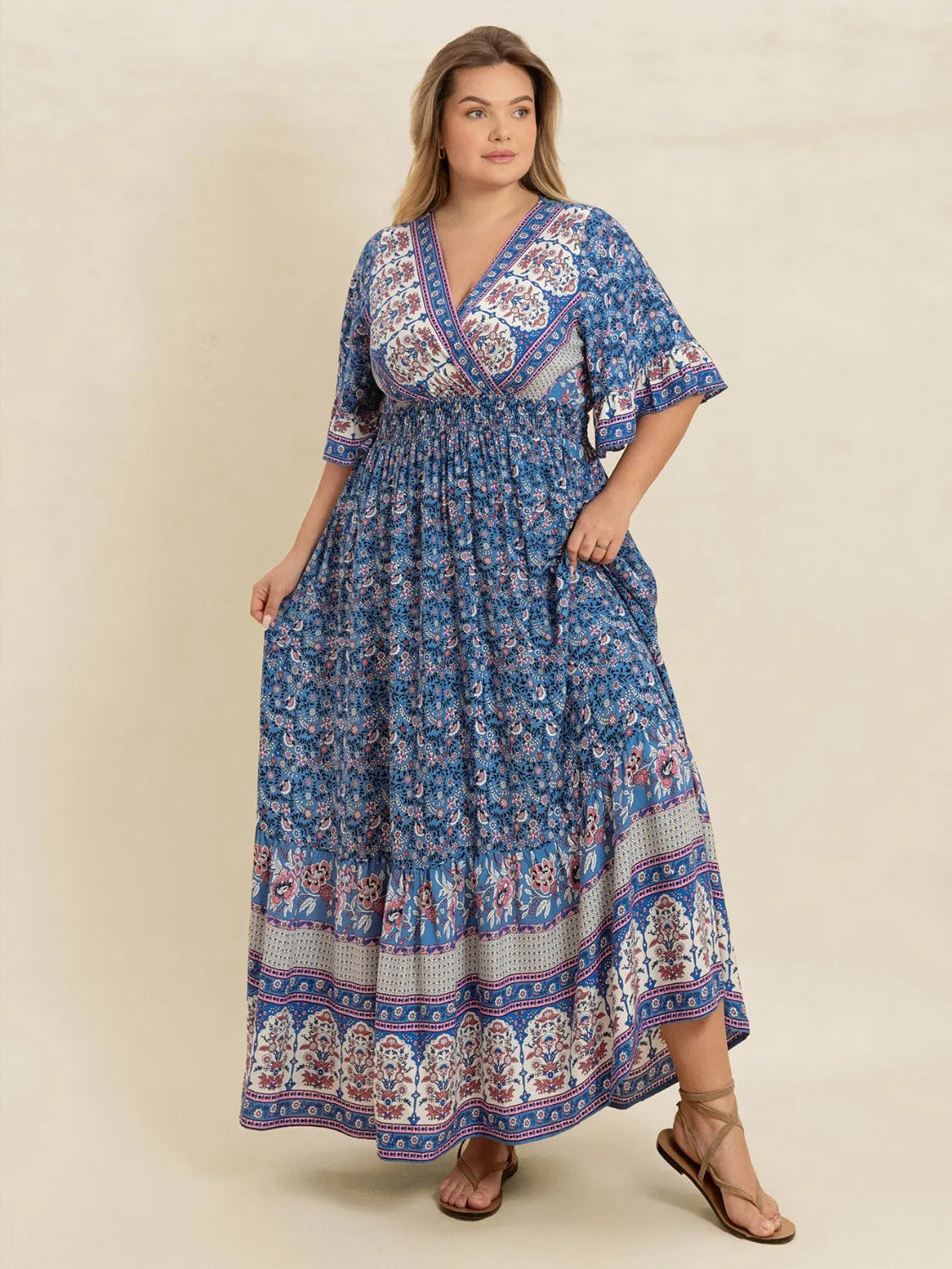 Plus Size Printed Surplice Half Sleeve Dress.