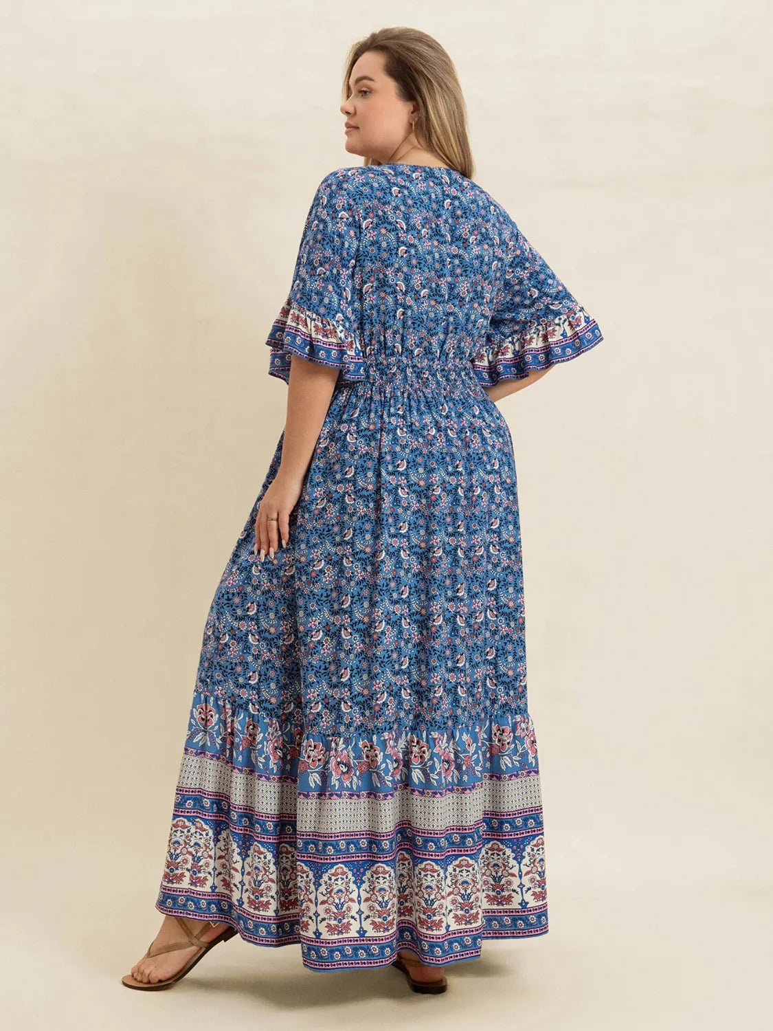 Plus Size Printed Surplice Half Sleeve Dress.