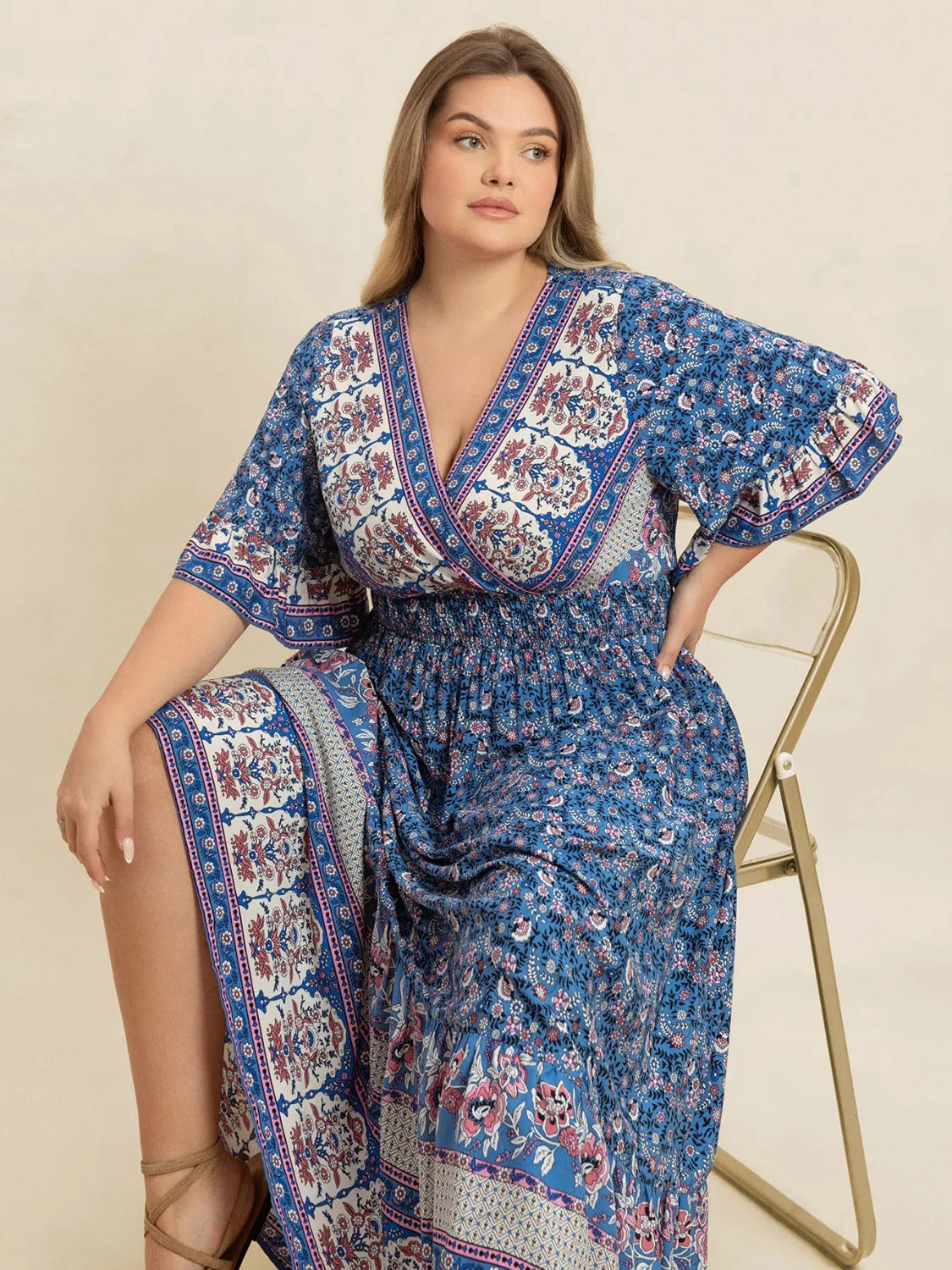 Plus Size Printed Surplice Half Sleeve Dress.