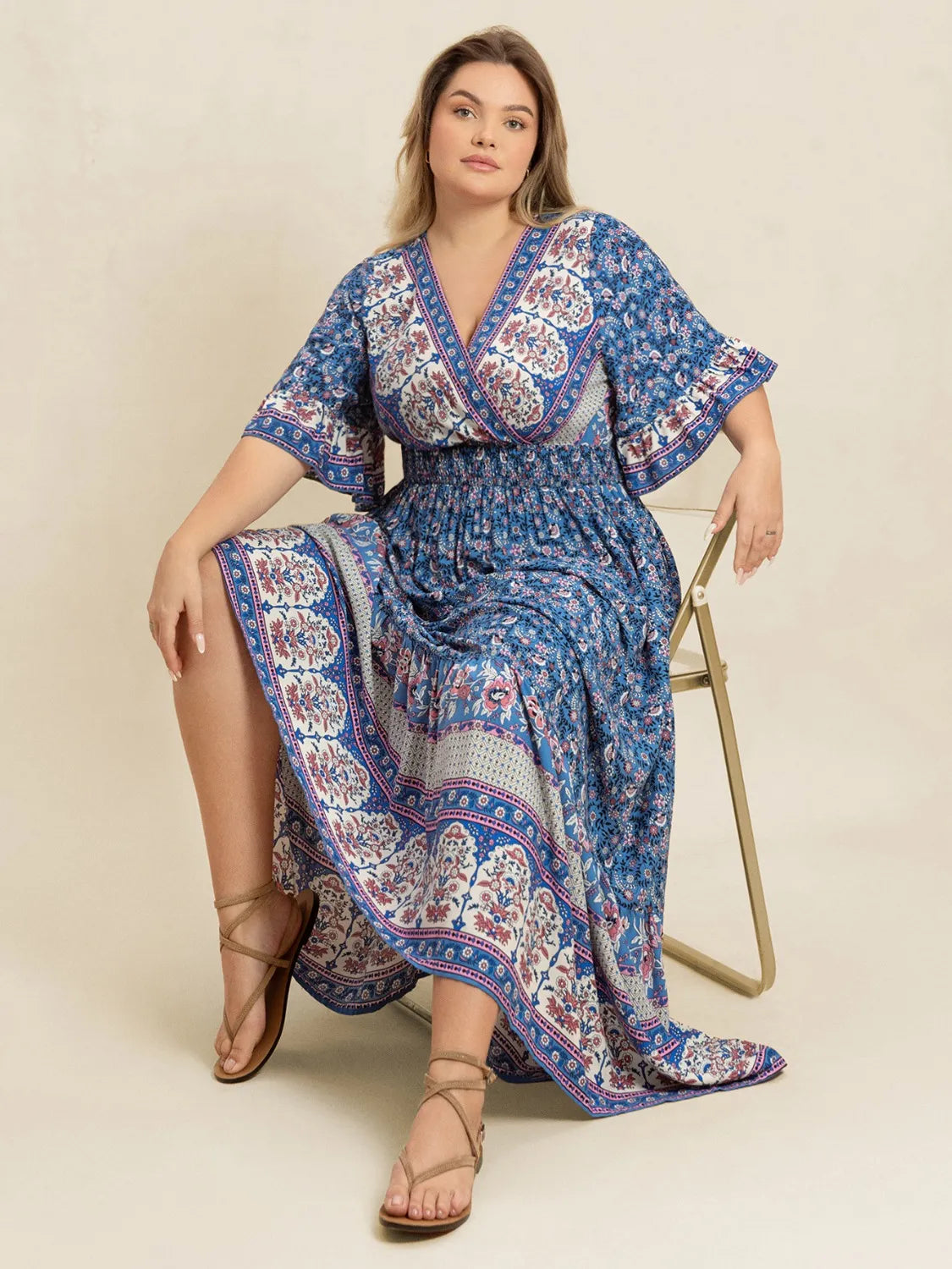 Plus Size Printed Surplice Half Sleeve Dress.