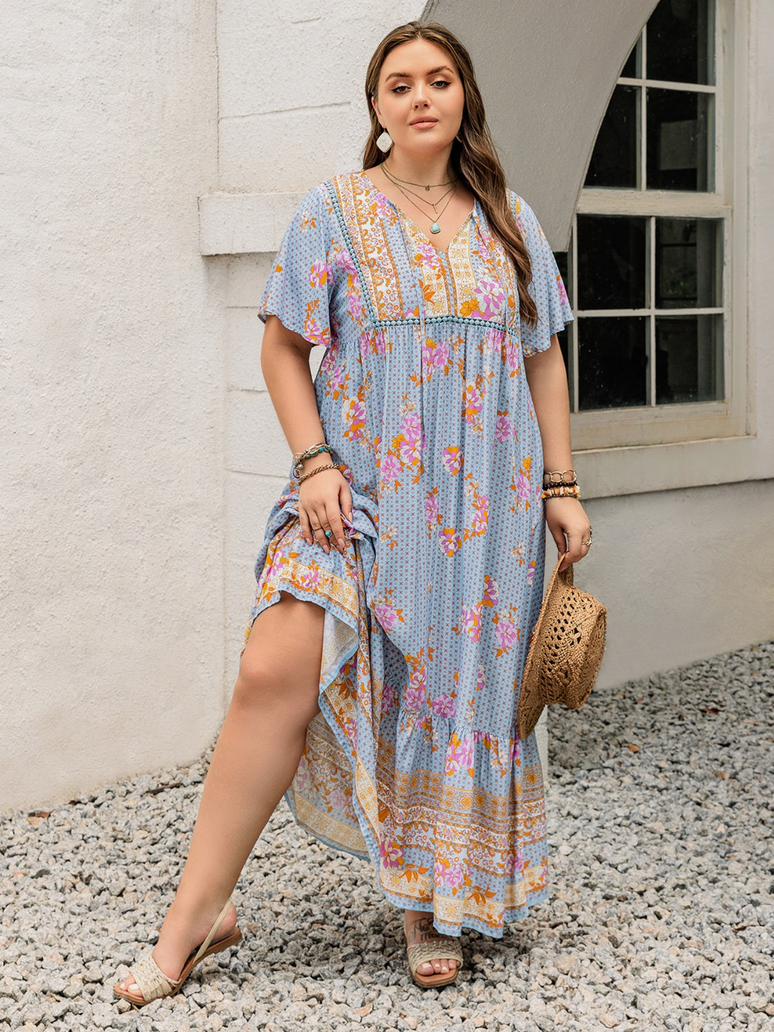 Plus Size Printed Tie Neck Flutter Sleeve Maxi Dress.