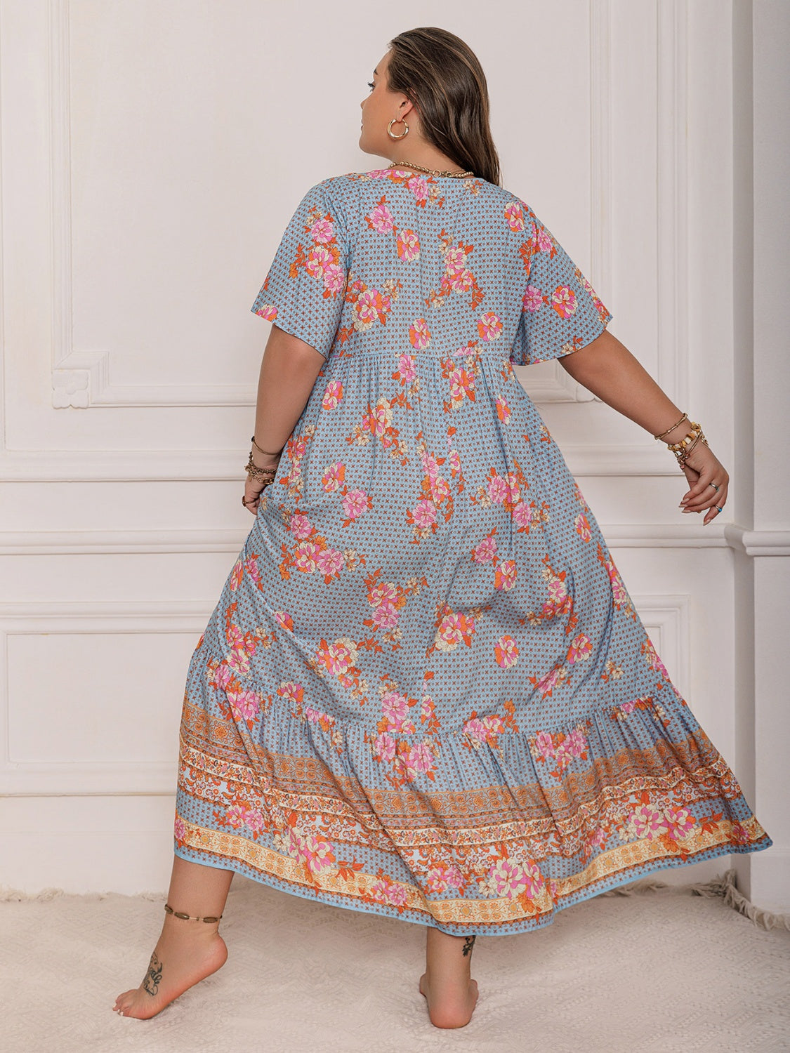 Plus Size Printed Tie Neck Flutter Sleeve Maxi Dress.