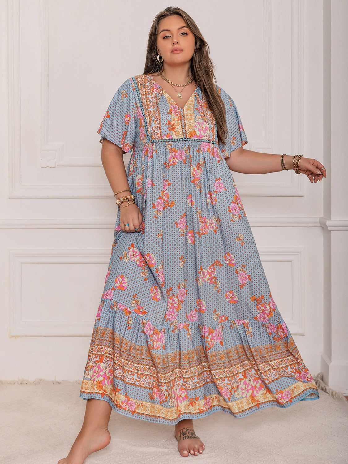 Plus Size Printed Tie Neck Flutter Sleeve Maxi Dress.