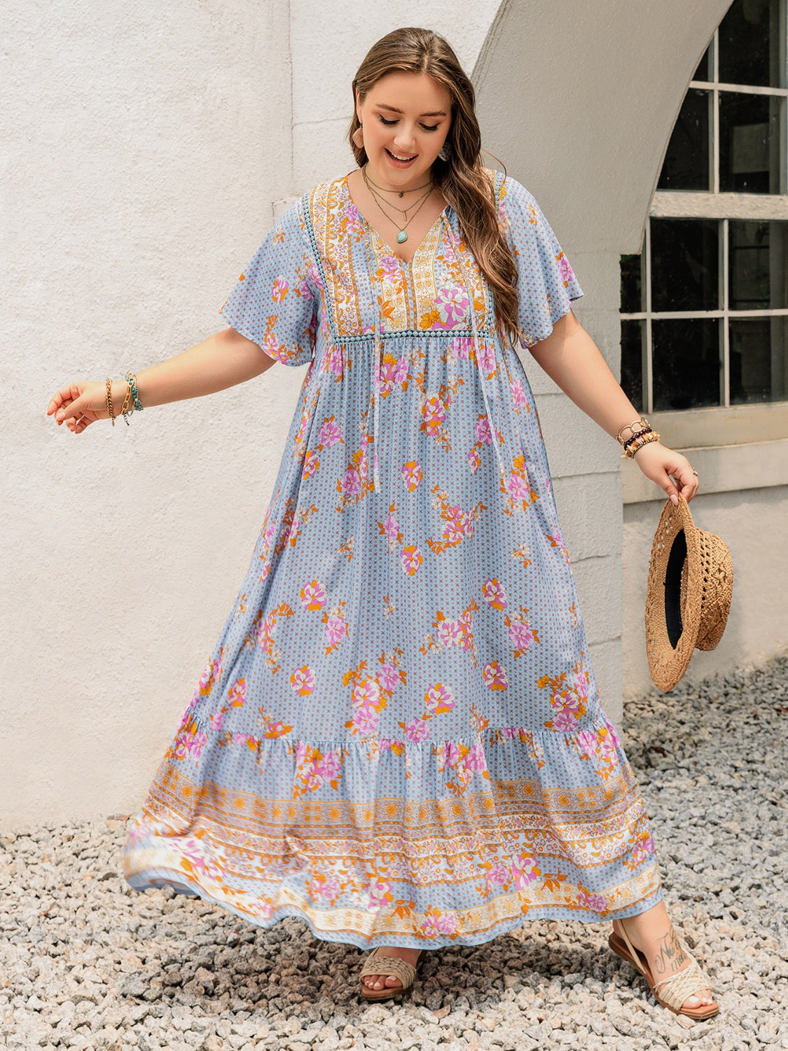 Plus Size Printed Tie Neck Flutter Sleeve Maxi Dress.