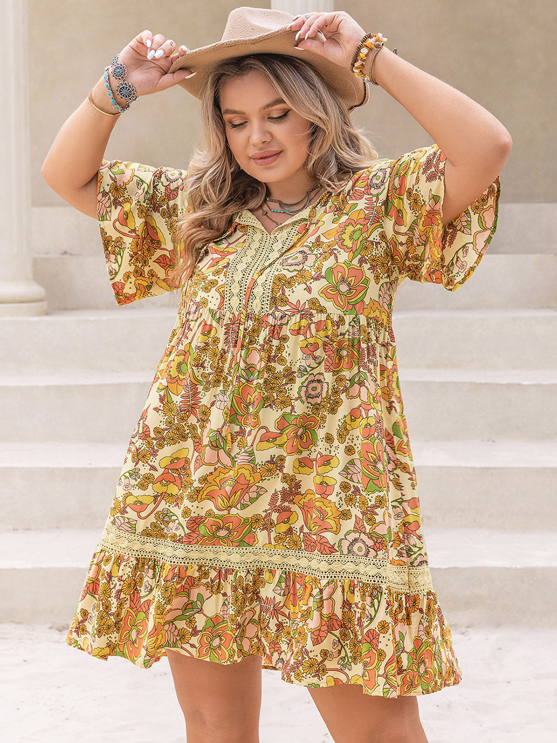 Plus Size Printed Tie Neck Short Sleeve Mini Dress.
