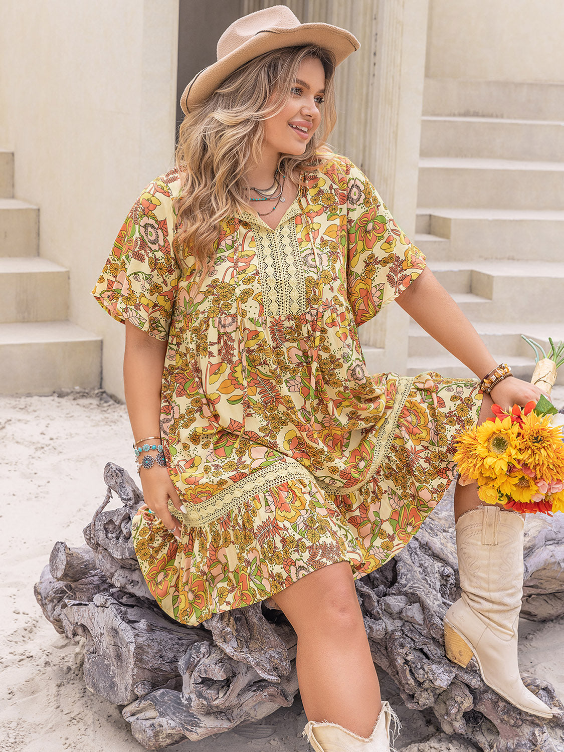 Plus Size Printed Tie Neck Short Sleeve Mini Dress.