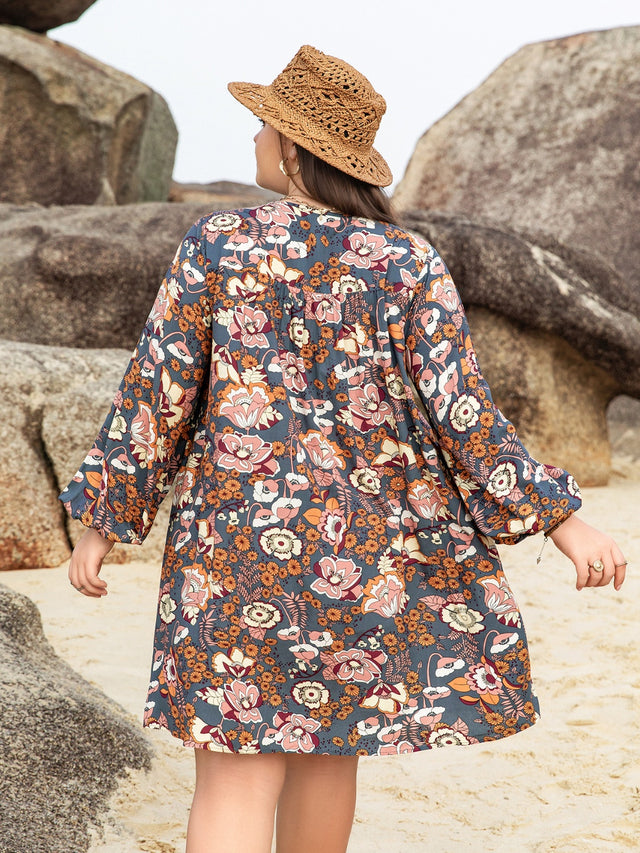 Plus Size Printed V-Neck Balloon Sleeve Mini Dress.