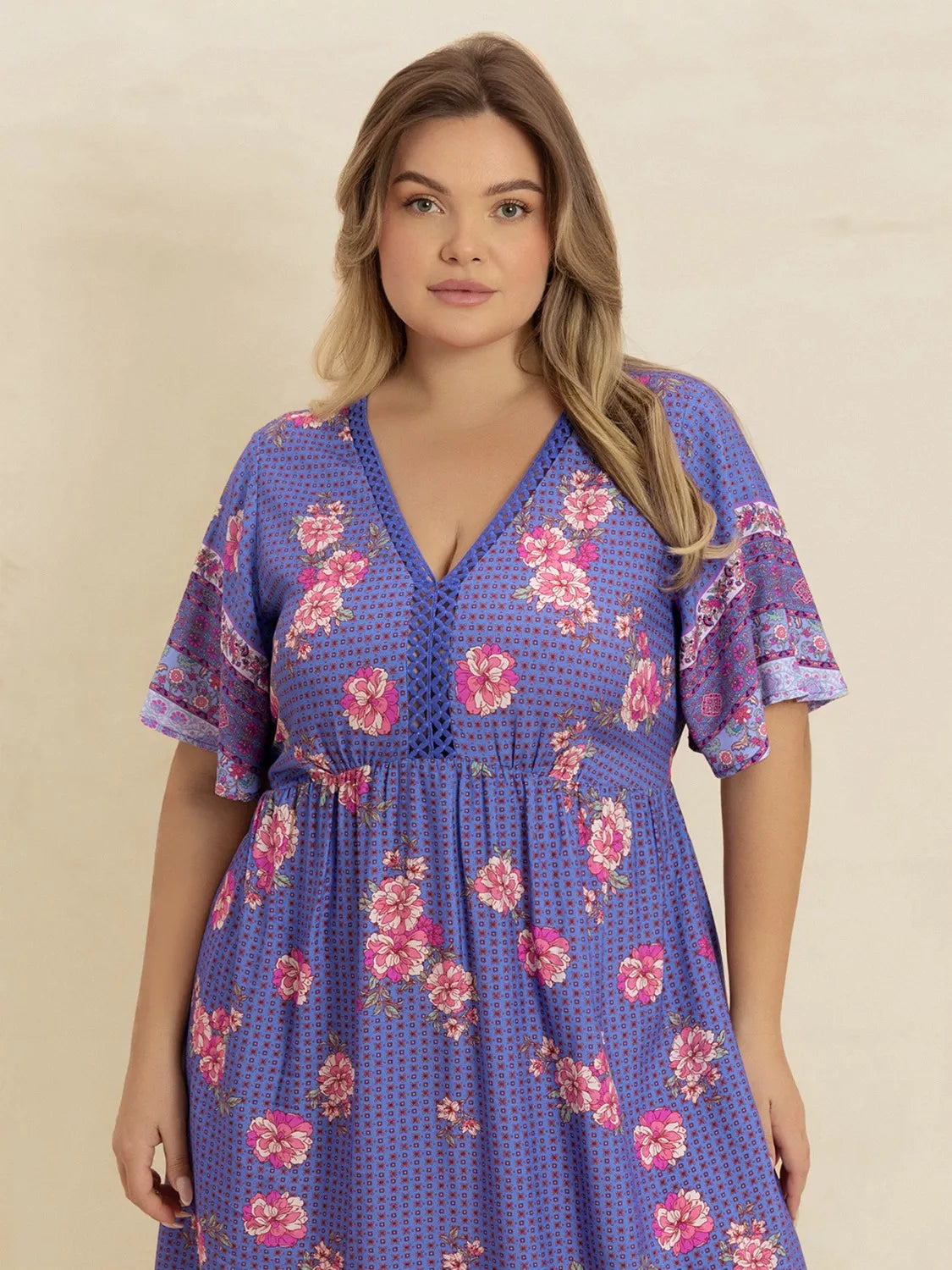 Plus Size Printed V-Neck Flutter Sleeve Dress.