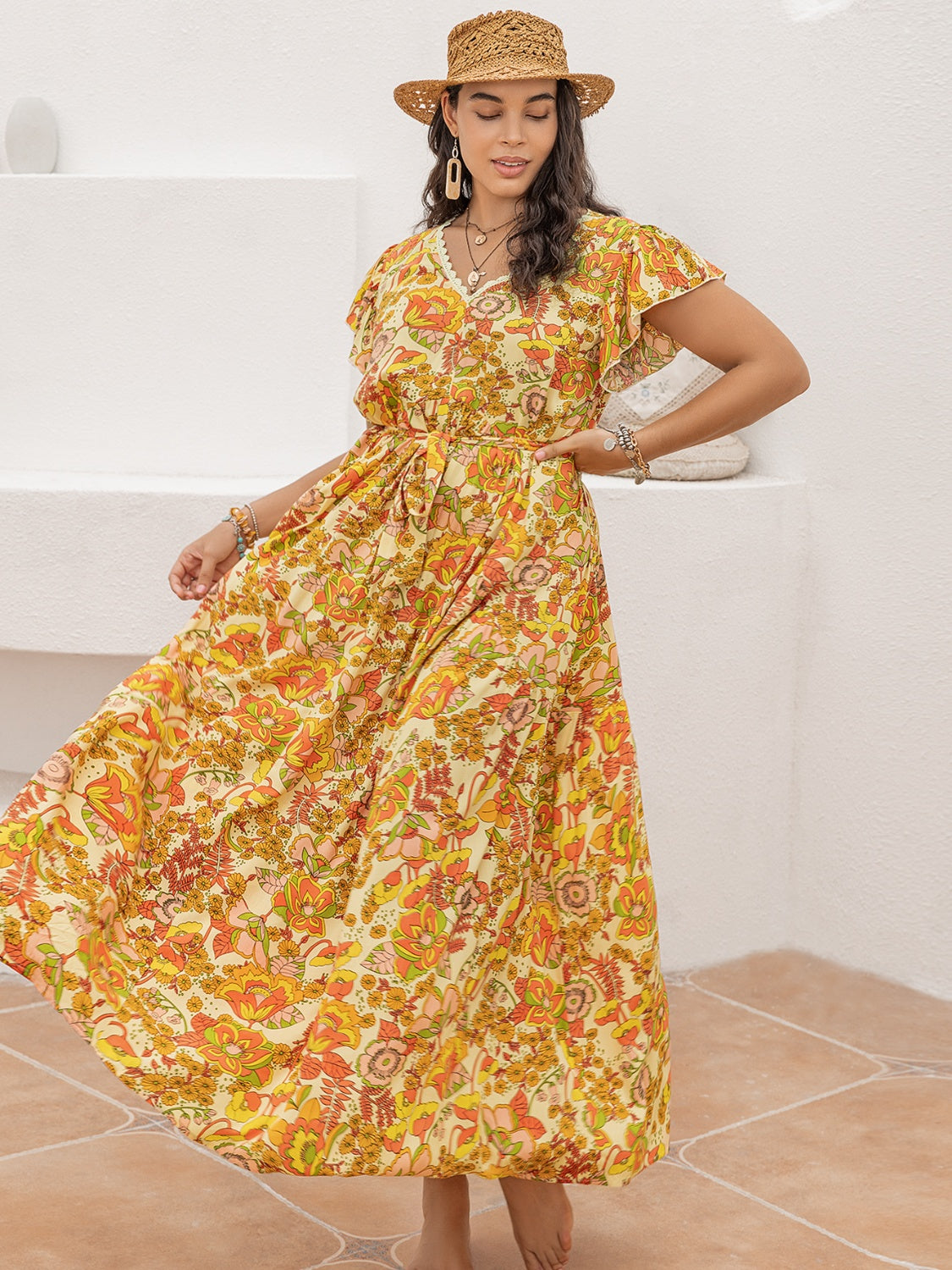 Plus Size Printed V-Neck Flutter Sleeve Tie Waist Maxi Dress.