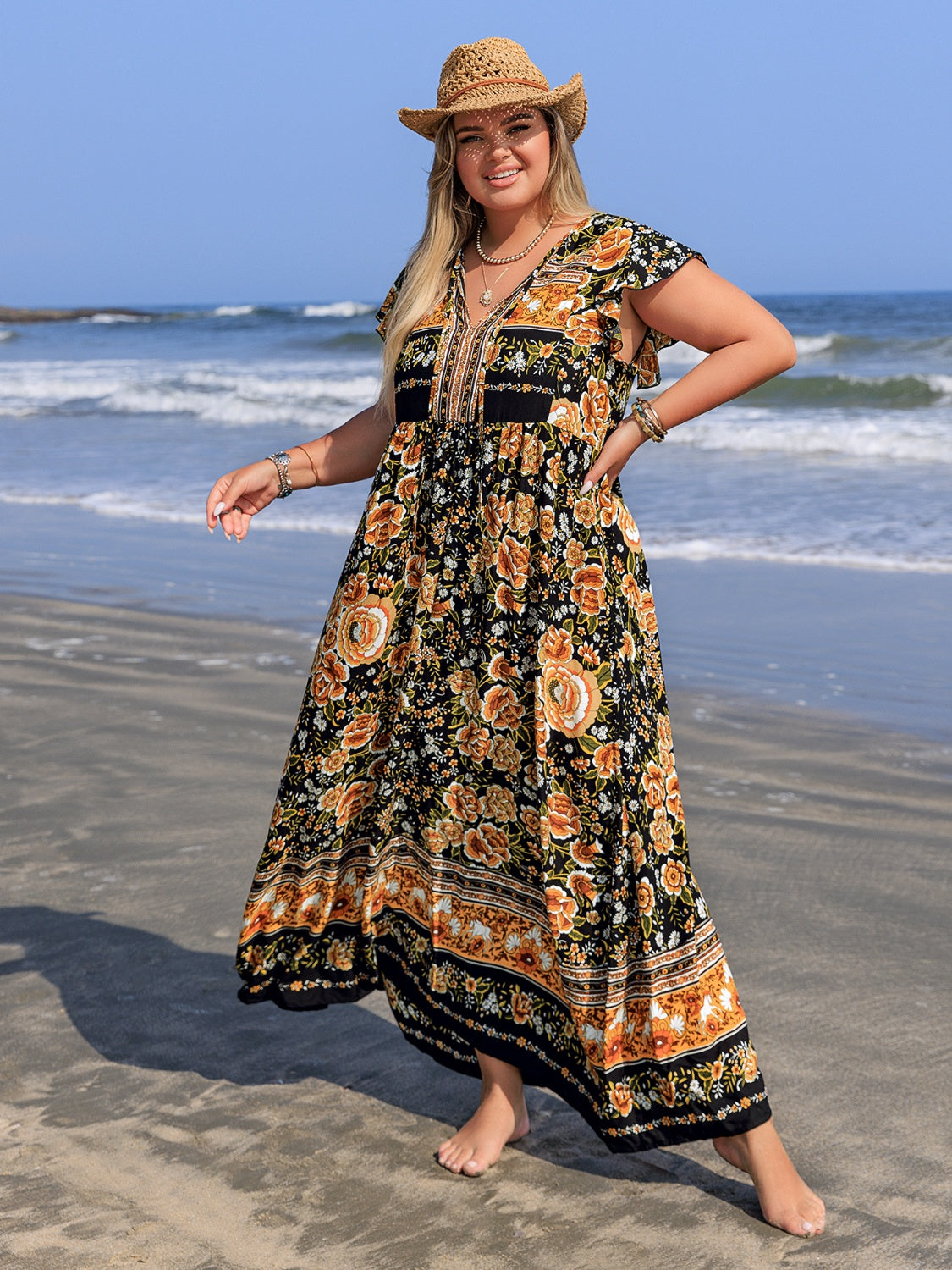 Plus Size Printed V-Neck Ruffle Cap Sleeve Maxi Dress.