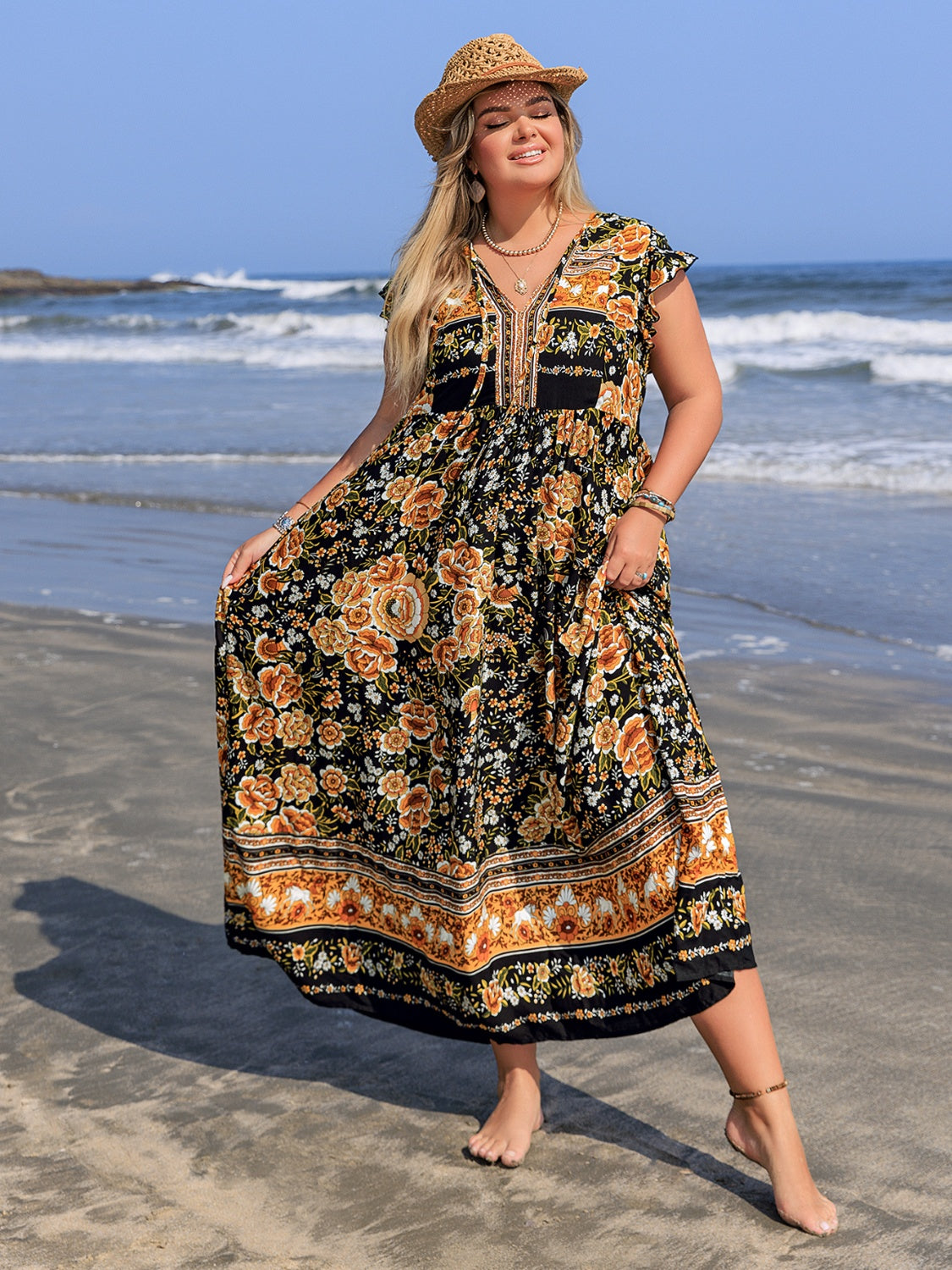 Plus Size Printed V-Neck Ruffle Cap Sleeve Maxi Dress.