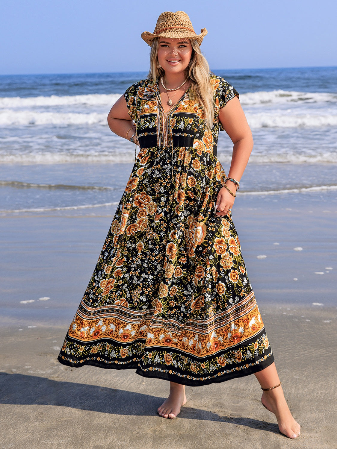 Plus Size Printed V-Neck Ruffle Cap Sleeve Maxi Dress.
