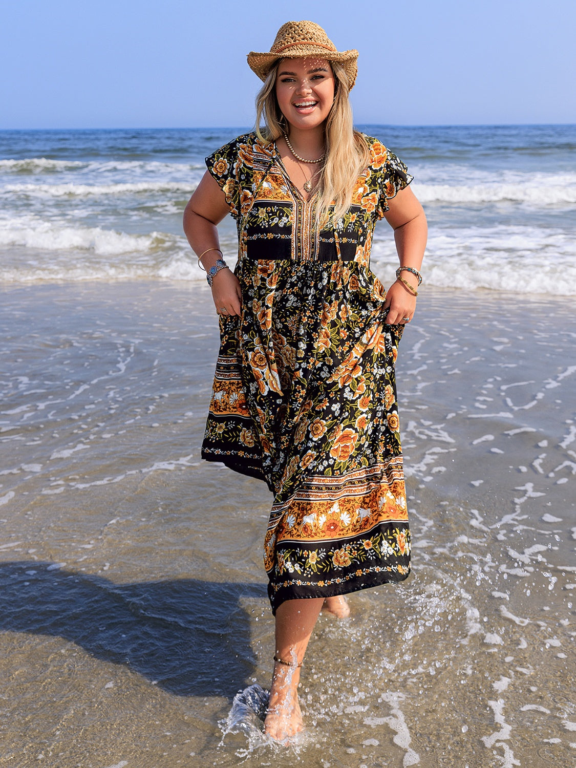 Plus Size Printed V-Neck Ruffle Cap Sleeve Maxi Dress.