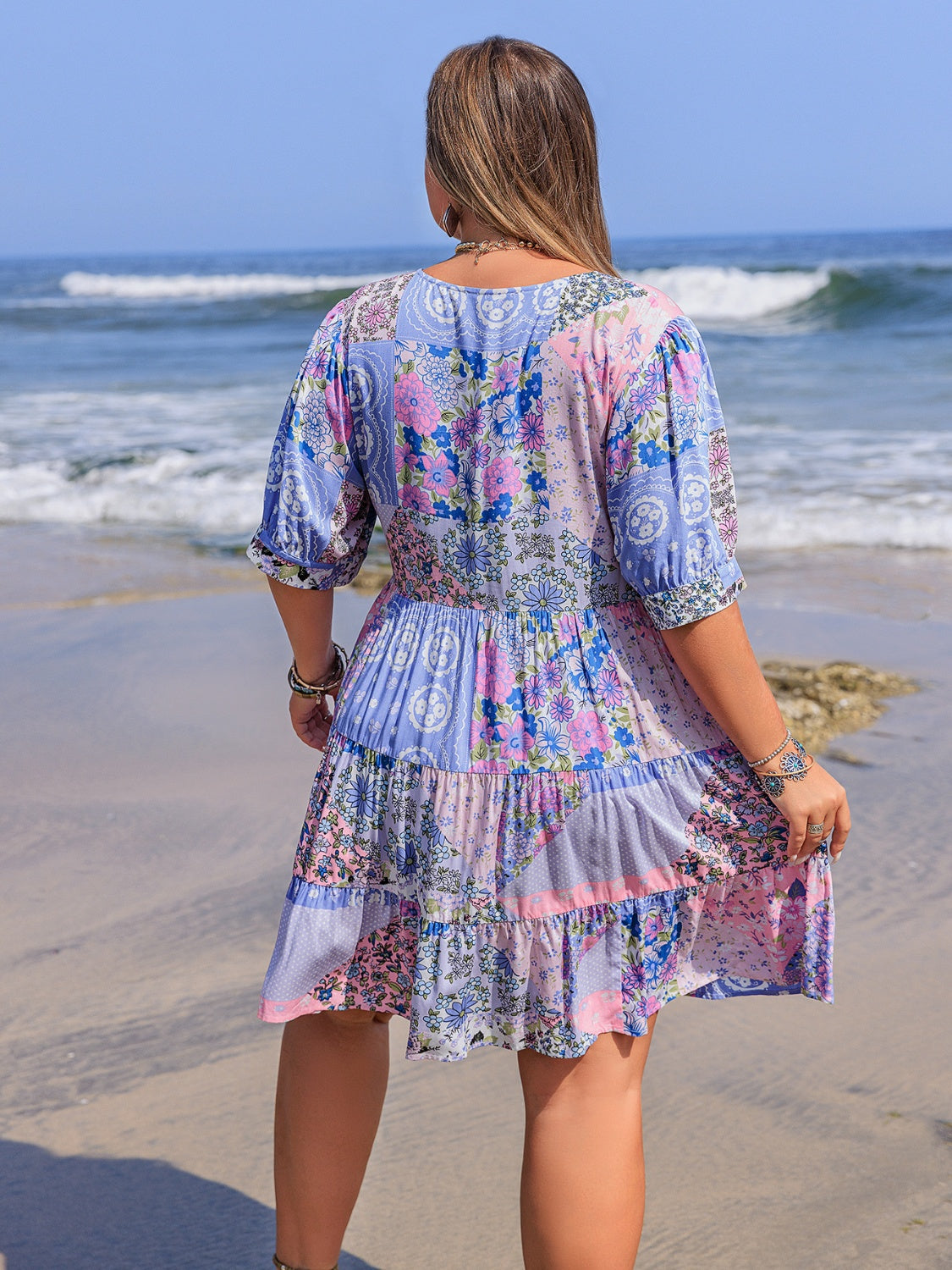 Plus Size Printed V-Neck Tiered Mini Dress.