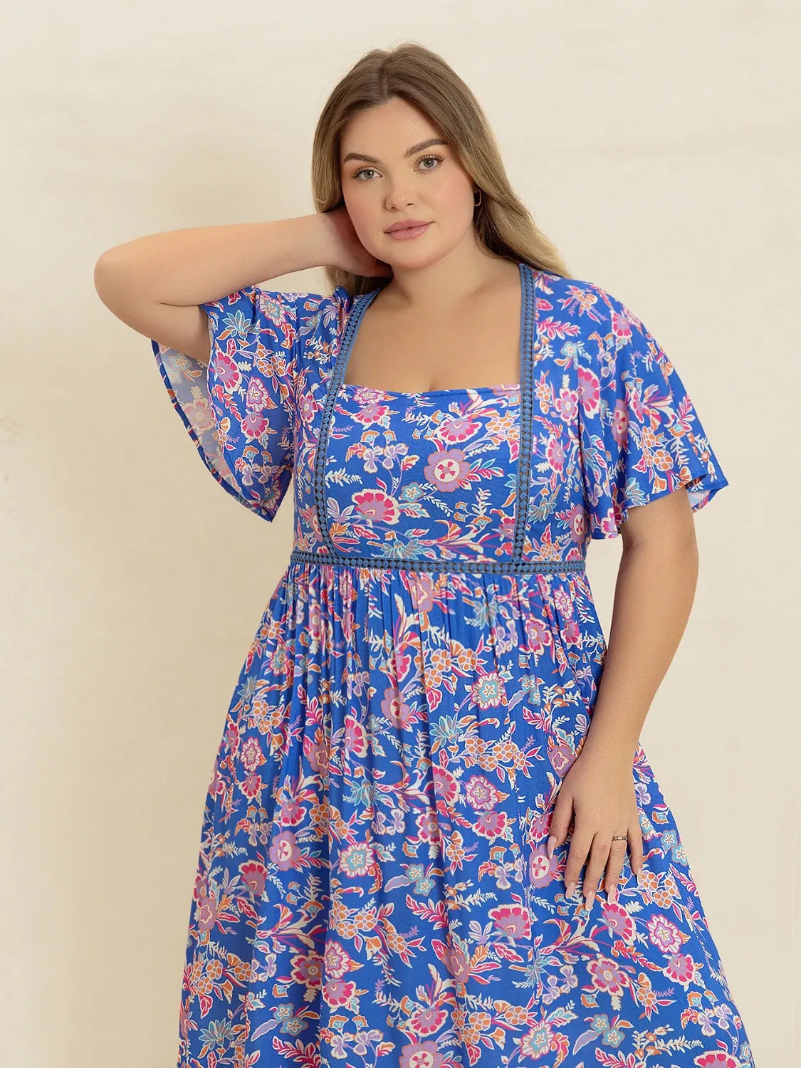 Plus Size Ruched Printed Short Sleeve Dress.