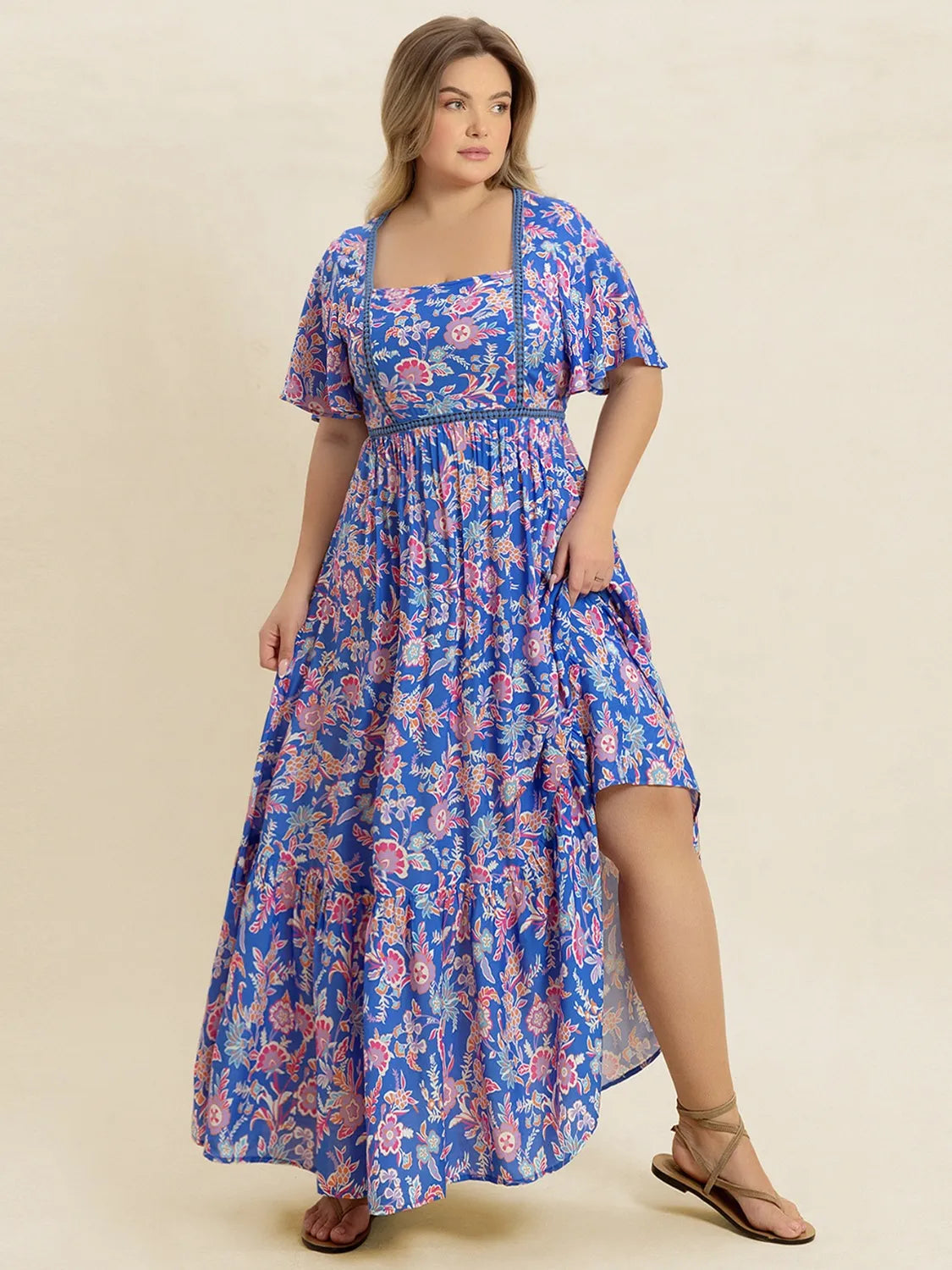 Plus Size Ruched Printed Short Sleeve Dress.