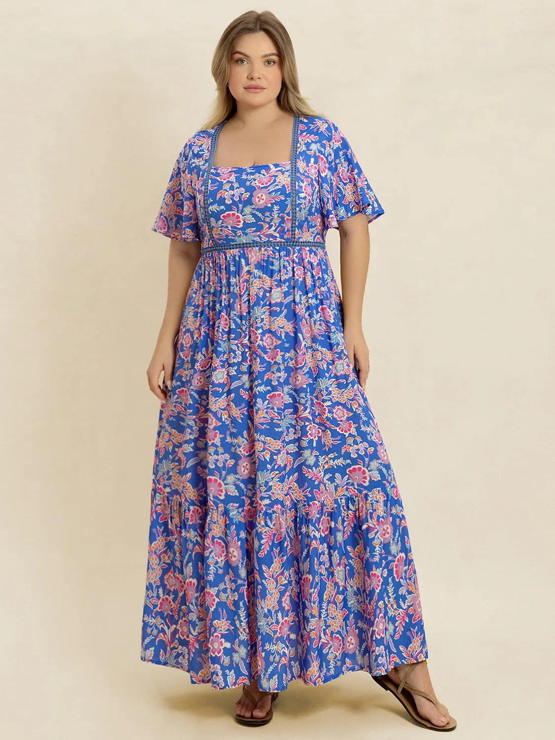 Plus Size Ruched Printed Short Sleeve Dress.