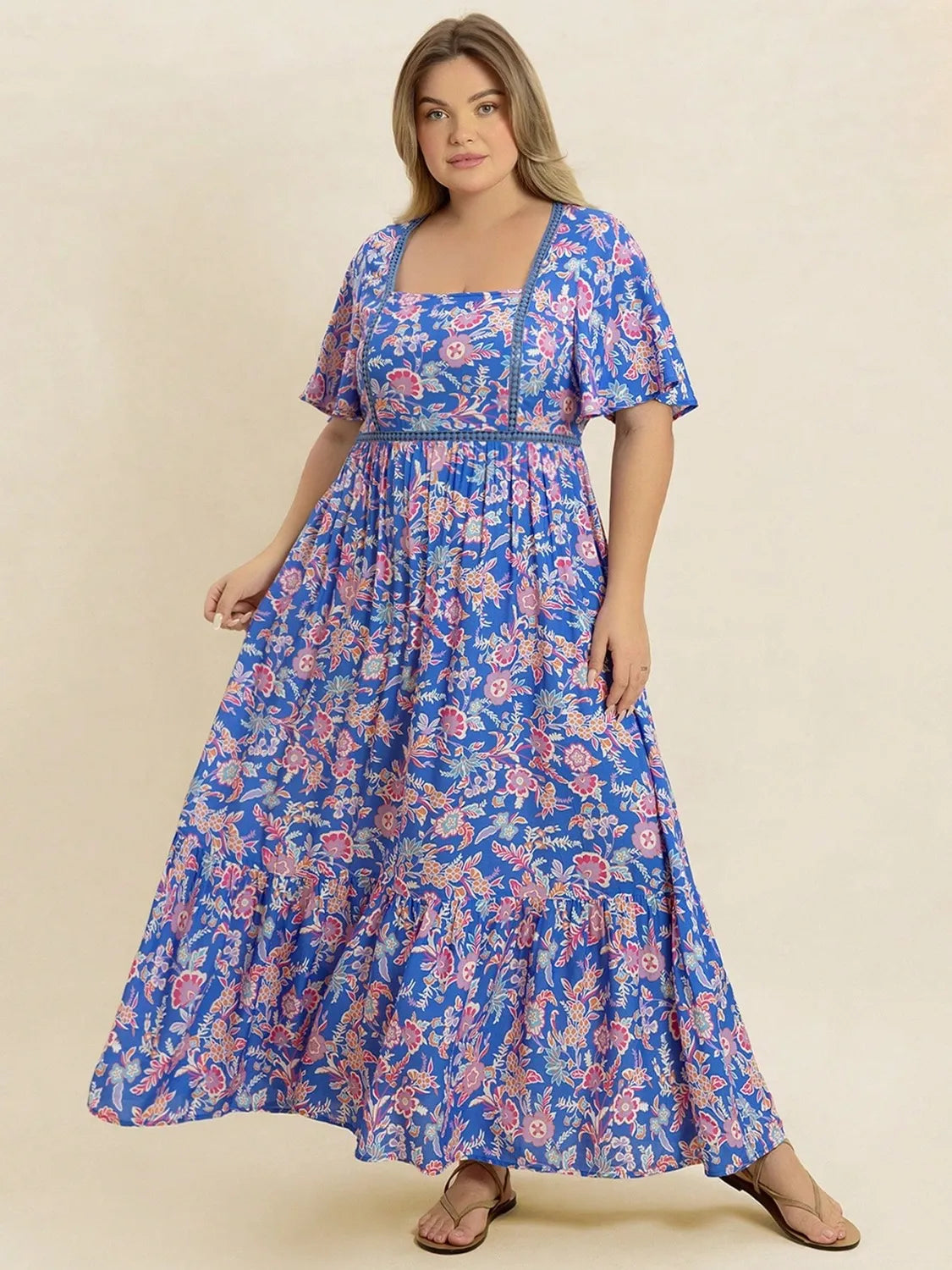 Plus Size Ruched Printed Short Sleeve Dress.