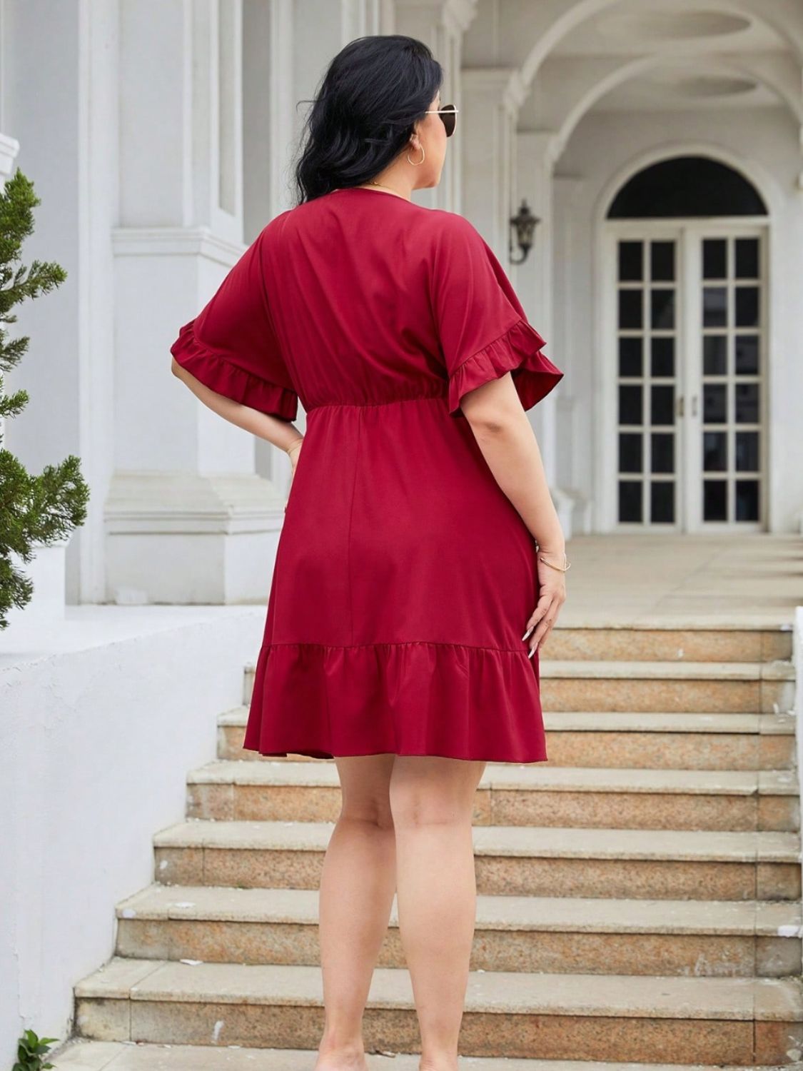 Plus Size Ruched Surplice Flounce Sleeve Mini Dress.