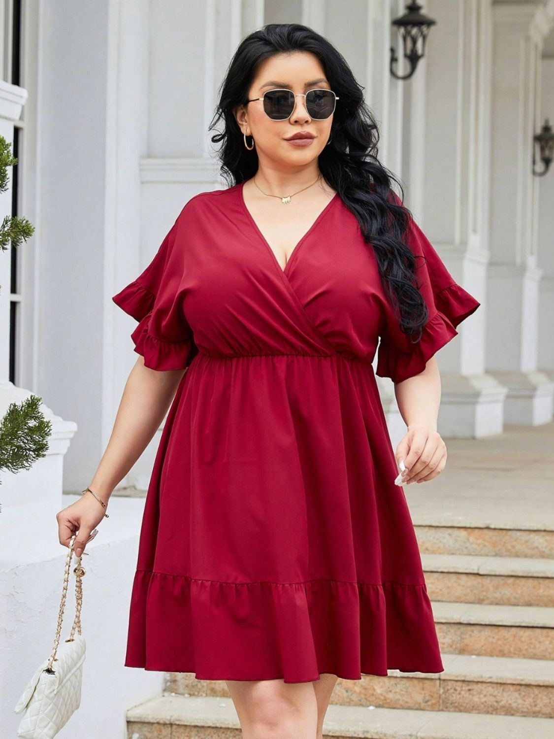 Plus Size Ruched Surplice Flounce Sleeve Mini Dress.