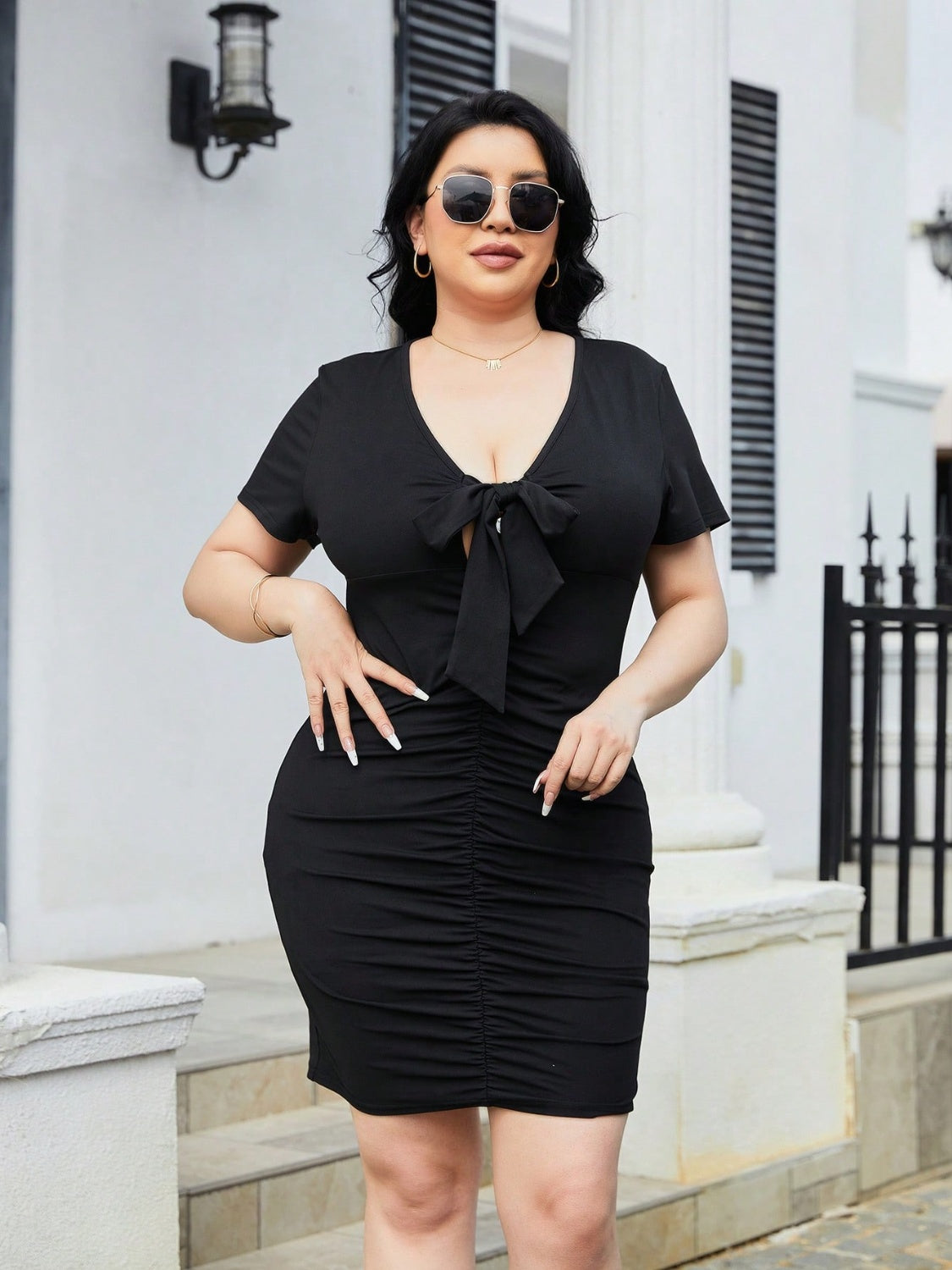 Plus Size Ruched Tied Short Sleeve Mini Dress.