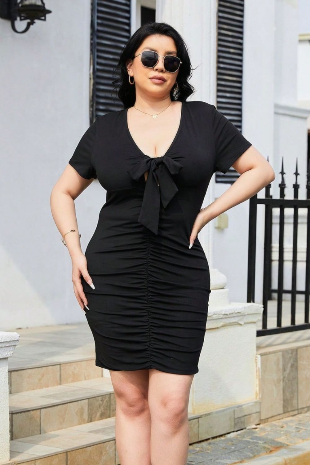 Plus Size Ruched Tied Short Sleeve Mini Dress.