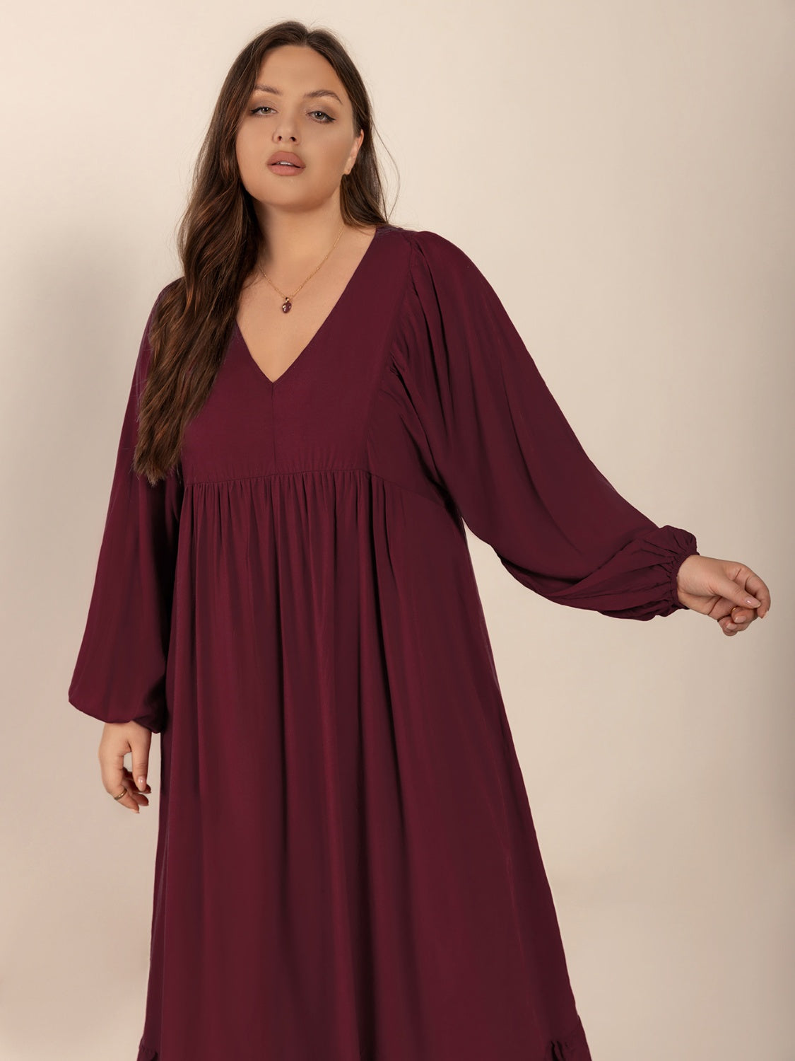 Plus Size Ruffled Hem V-Neck Balloon Sleeve Dress.