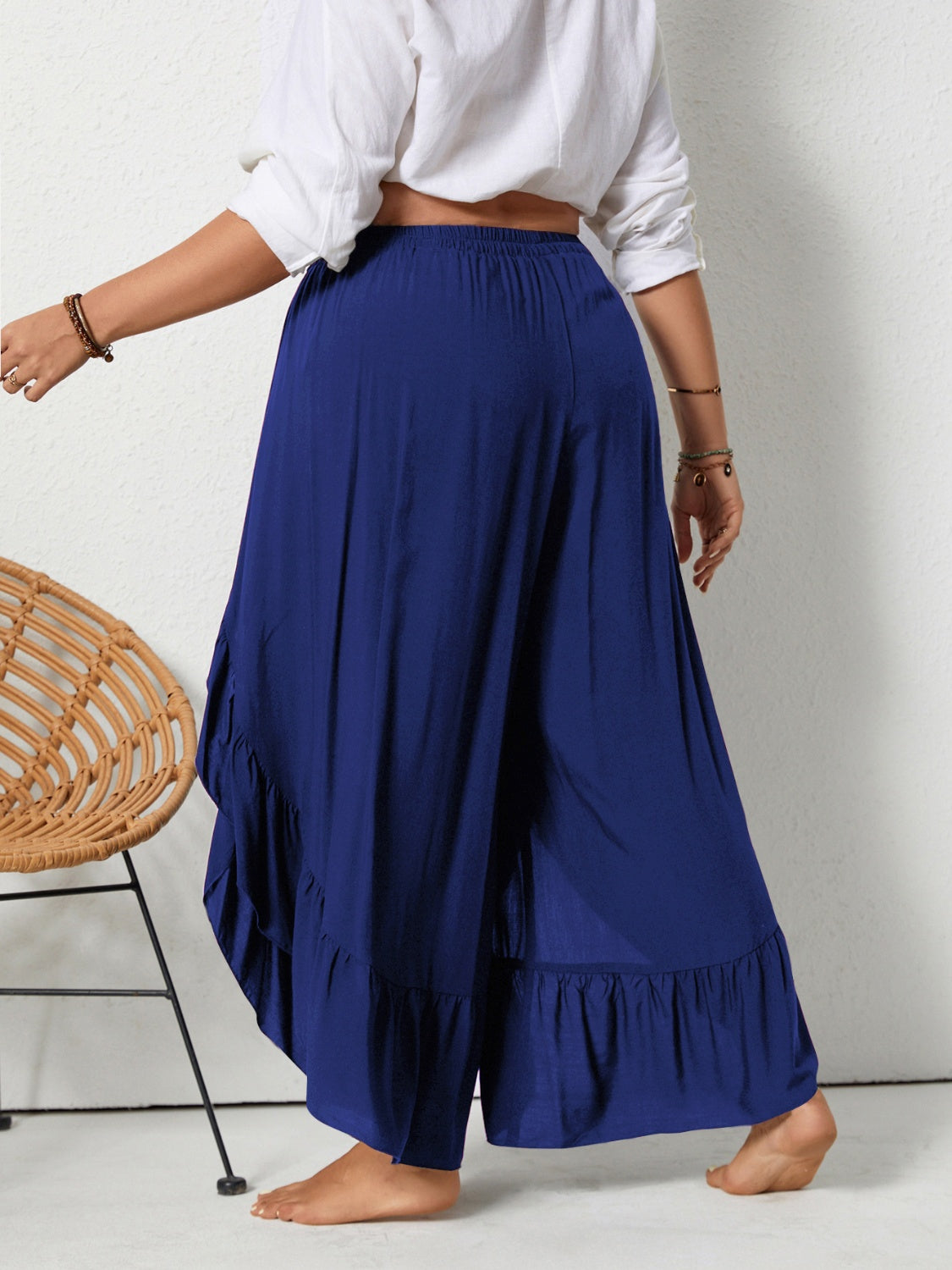 Plus size ruffled wide leg pants with slit, opaque.