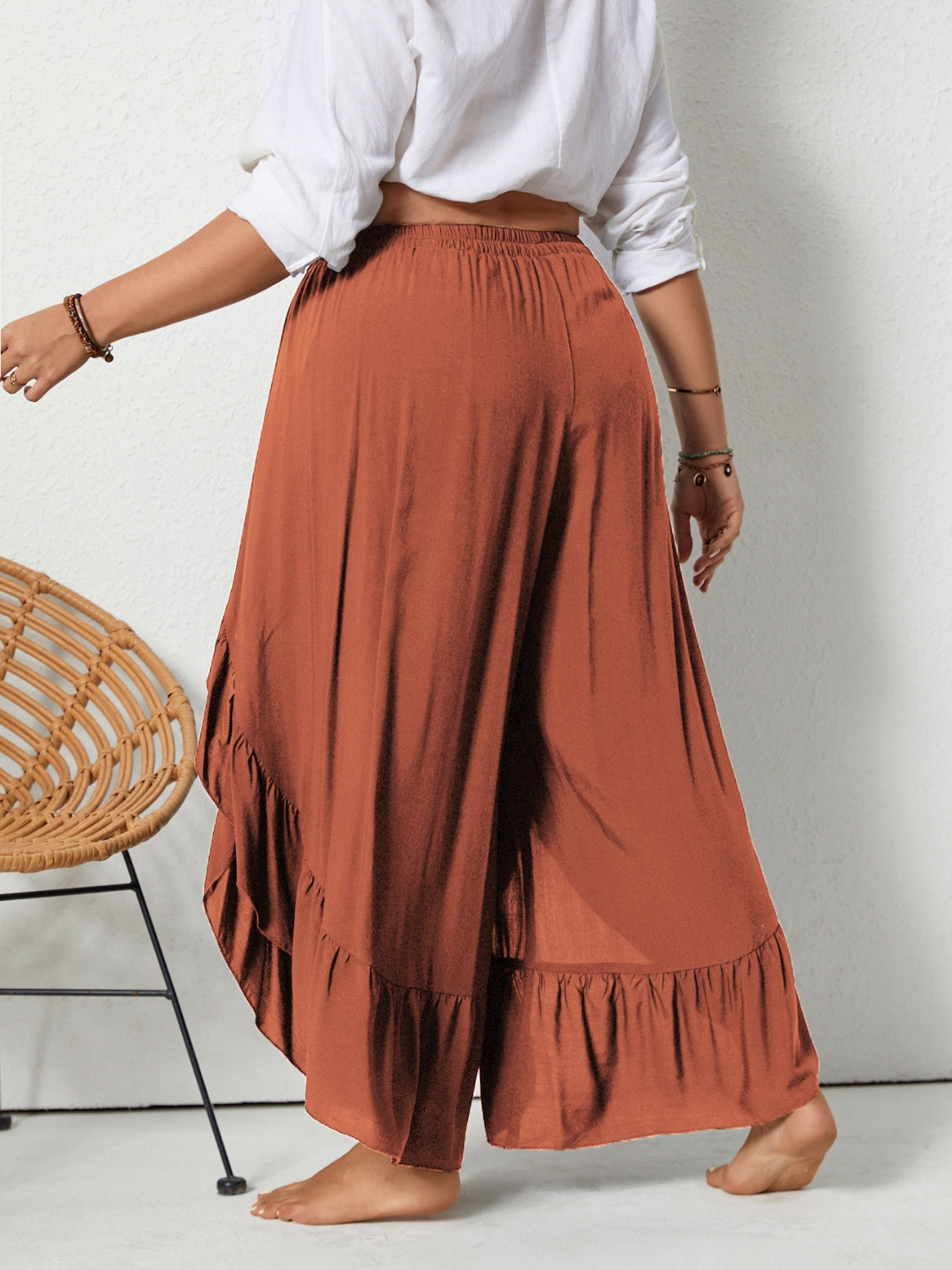 Plus size ruffled wide leg pants with slit, opaque.